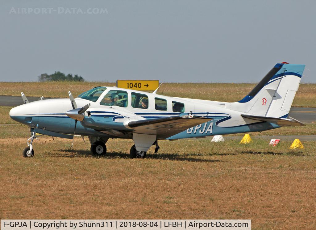 F-GPJA, 1988 Beech 58 Baron C/N TH-1532, Parked in the grass...