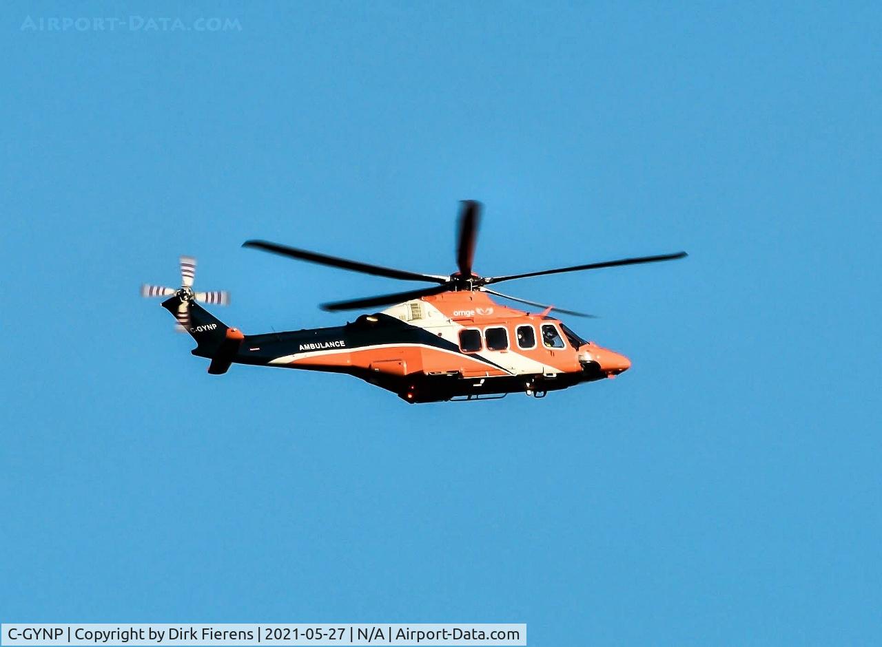 C-GYNP, 2011 AgustaWestland AW-139 C/N 41257, Flying past Carleton Place, Ont.  down hwy #7.