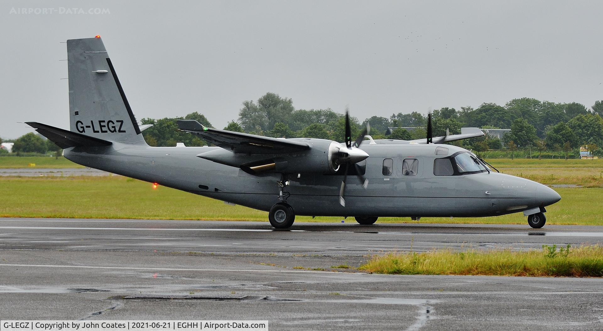 G-LEGZ, 1980 Rockwell Commander 695 C/N 11629, Taxiing in the rain for departure