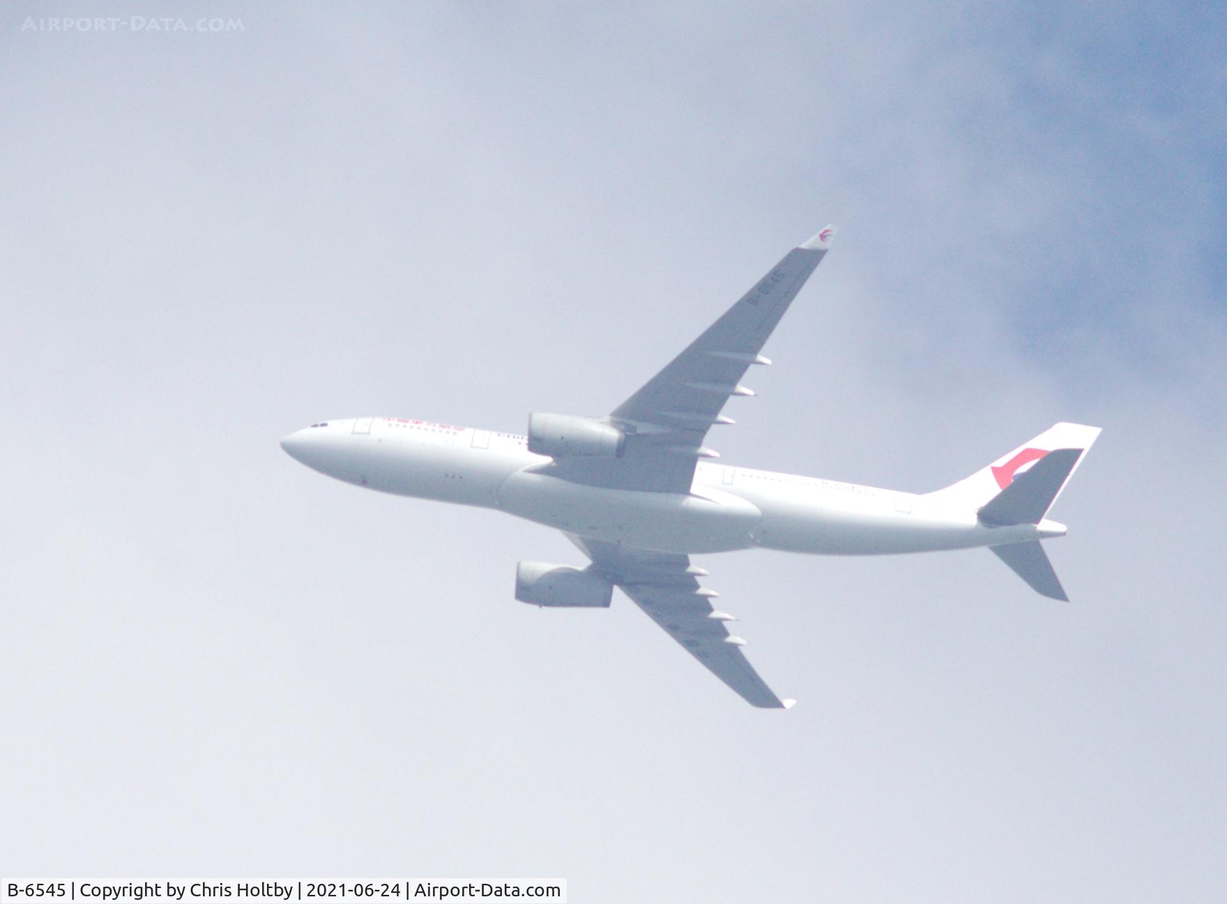 B-6545, 2011 Airbus A330-243 C/N 1291, Back in China Eastern Airlines livery over Potters Bar, Herts