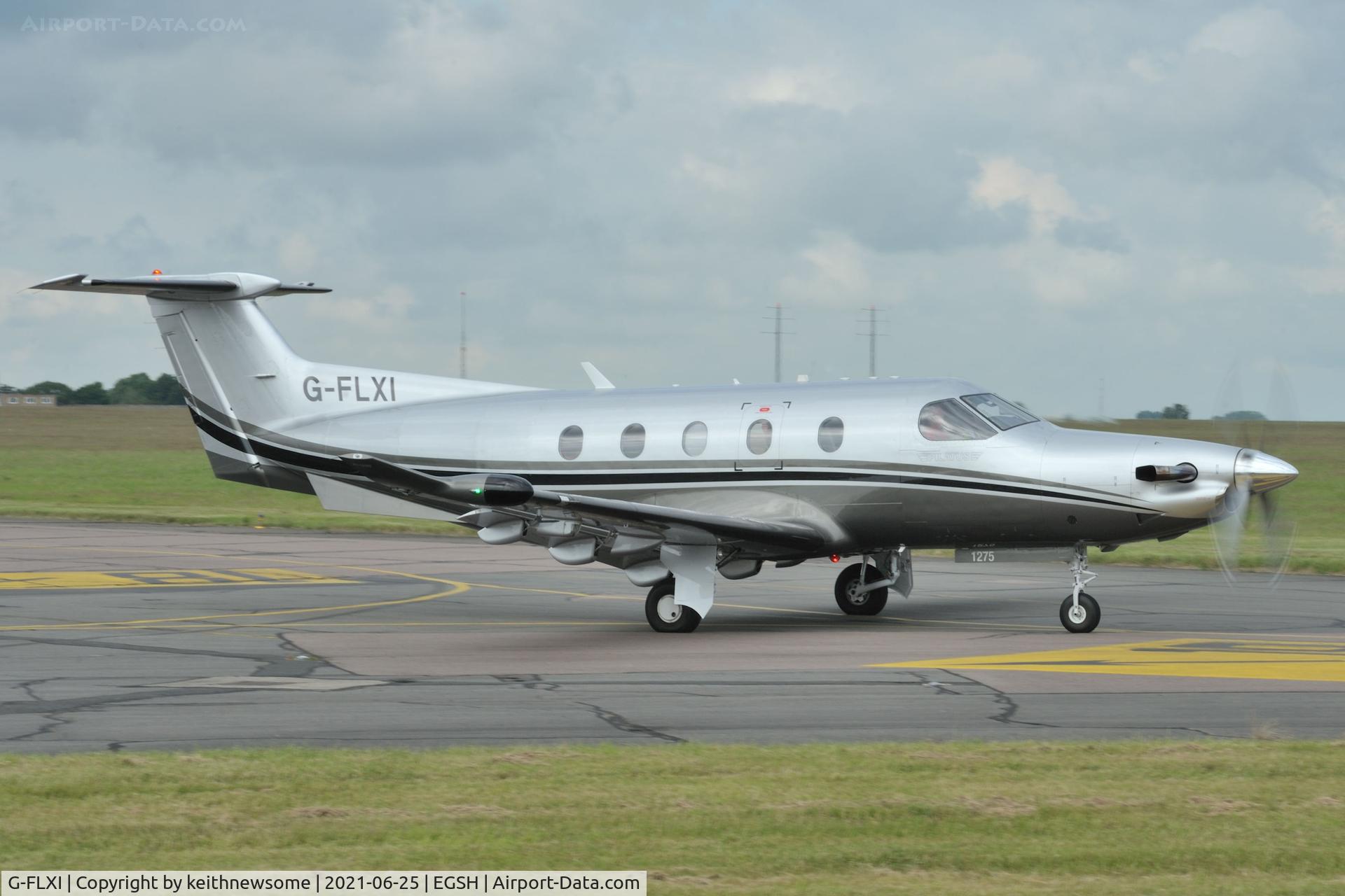 G-FLXI, 2011 Pilatus PC-12/47E C/N 1275, Leaving Norwich.