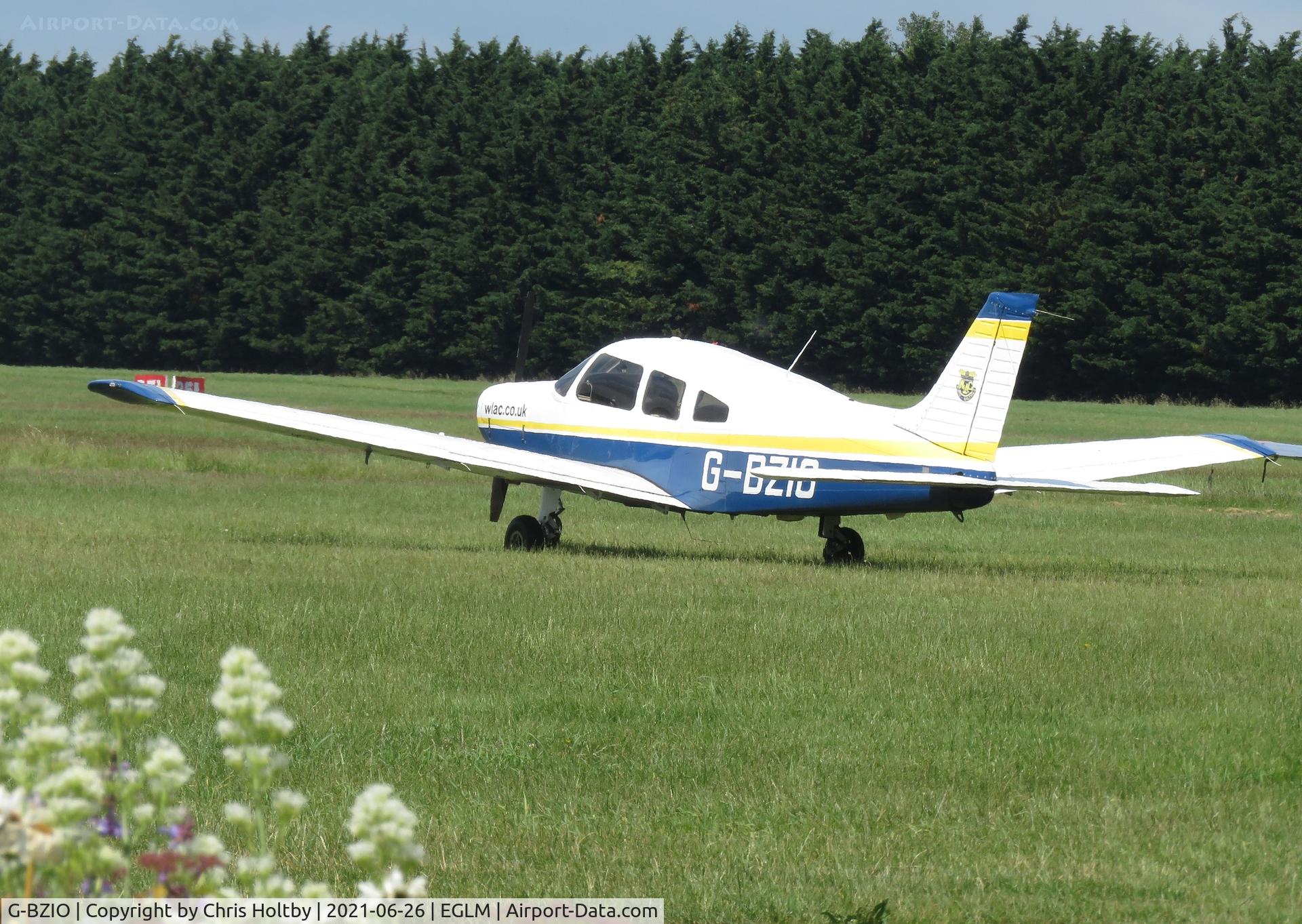 G-BZIO, 2000 Piper PA-28-161 Cherokee Warrior III C/N 2842085, Parked at its base at White Waltham sporting the West London Aero Club colours.