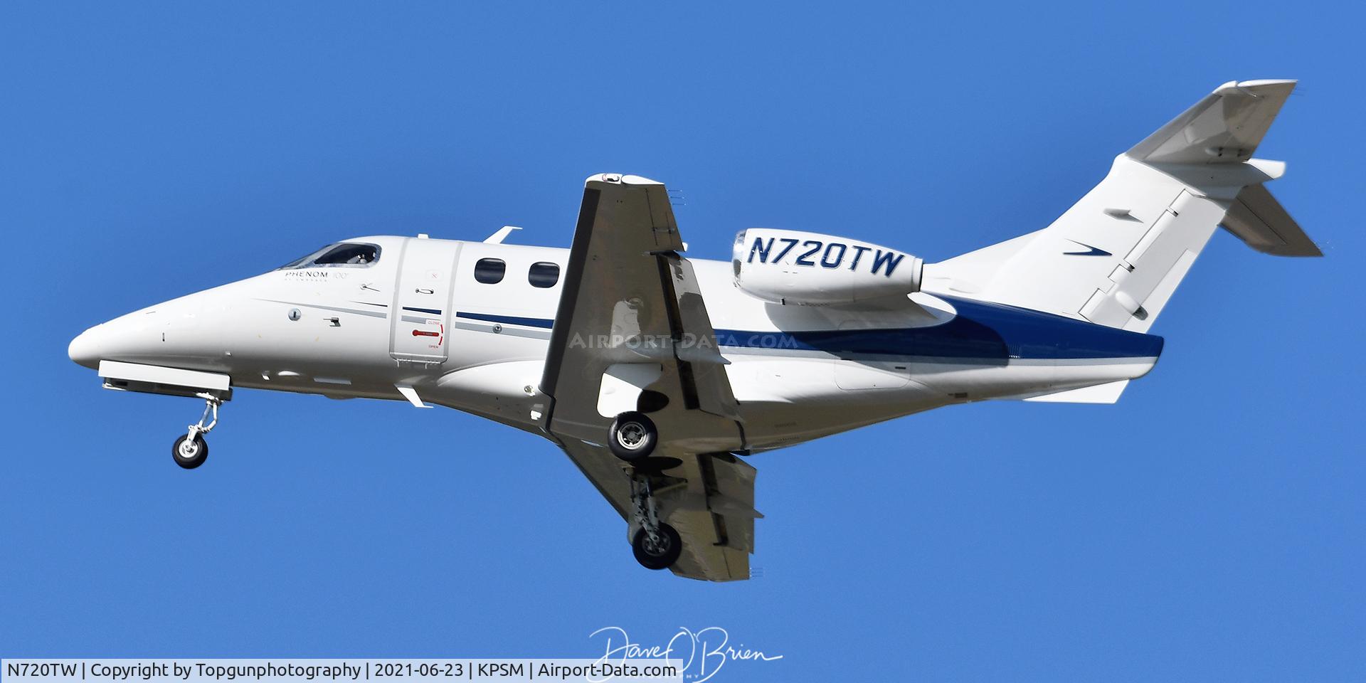 N720TW, 1999 Embraer EMB-500 Phenom 100 C/N 30319, working the pattern at PSM