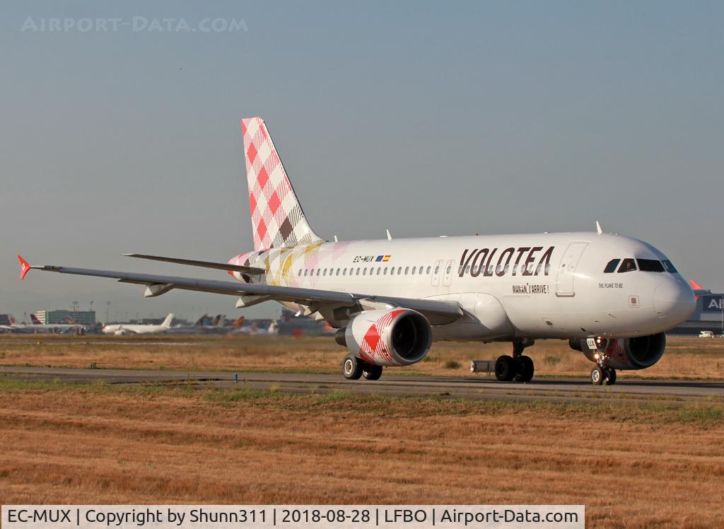 EC-MUX, 2003 Airbus A319-111 C/N 2037, Taxiing holding point rwy 14L for departure... 'Maman, j'arrive' titles