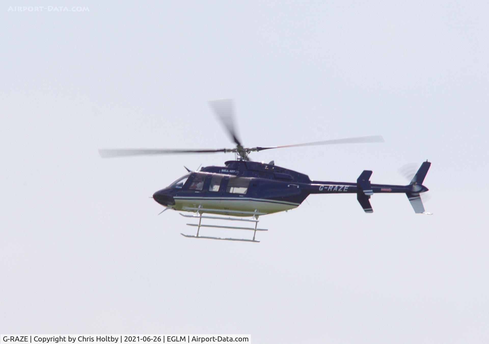 G-RAZE, 2020 Bell 407 C/N 54914, Lifted off and leaving White Waltham, Berkshire