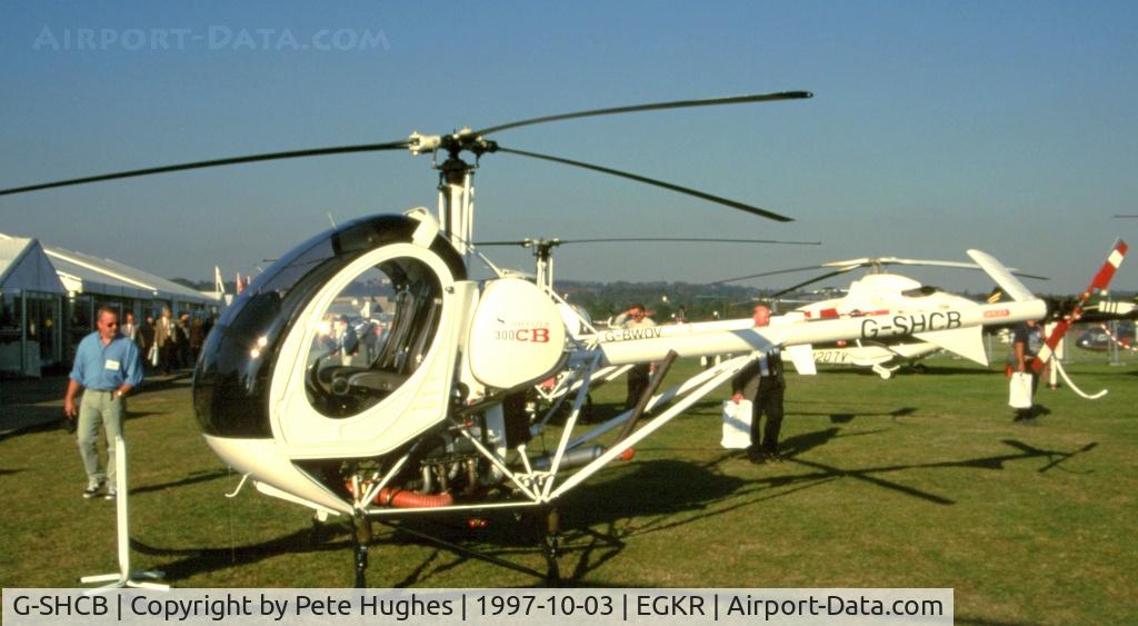 G-SHCB, 1996 Schweizer 269C-1 C/N 0038, G-SHCB H269 at Redhill Helitech 1997