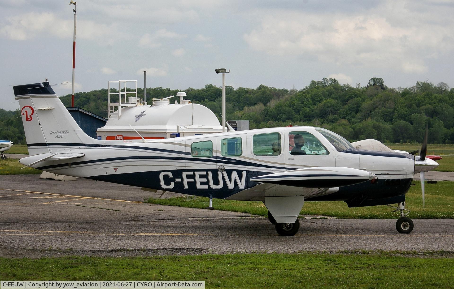 C-FEUW, 1992 Beech 36 Bonanza Bonanza C/N E2762, Beech Bonanza taxiing off the ramp at CYRO after getting fuel