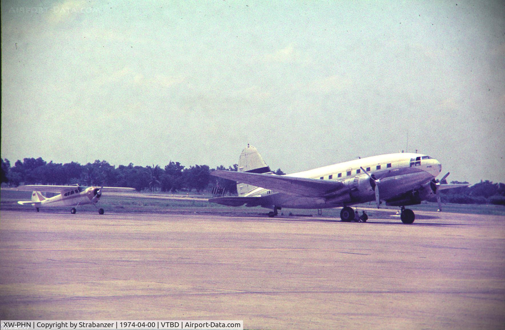XW-PHN, Curtiss-Wright C-46R-CW-20B C/N 30257, A scan from one of my old slides.
