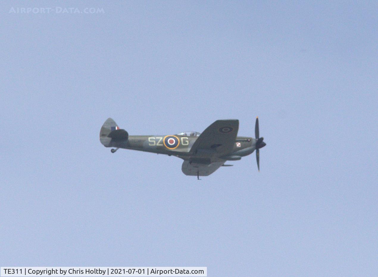 TE311, 1945 Supermarine 361 Spitfire LF.XVIe C/N CBAF.IX.4497, Flying past Amwell, Hertfordshire in company with AB910
