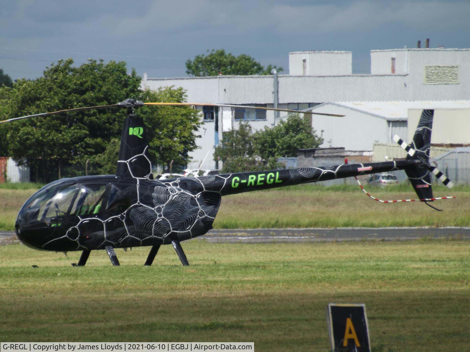 G-REGL, 2003 Robinson R44 Raven II C/N 10235, At Gloucestershire Airport.