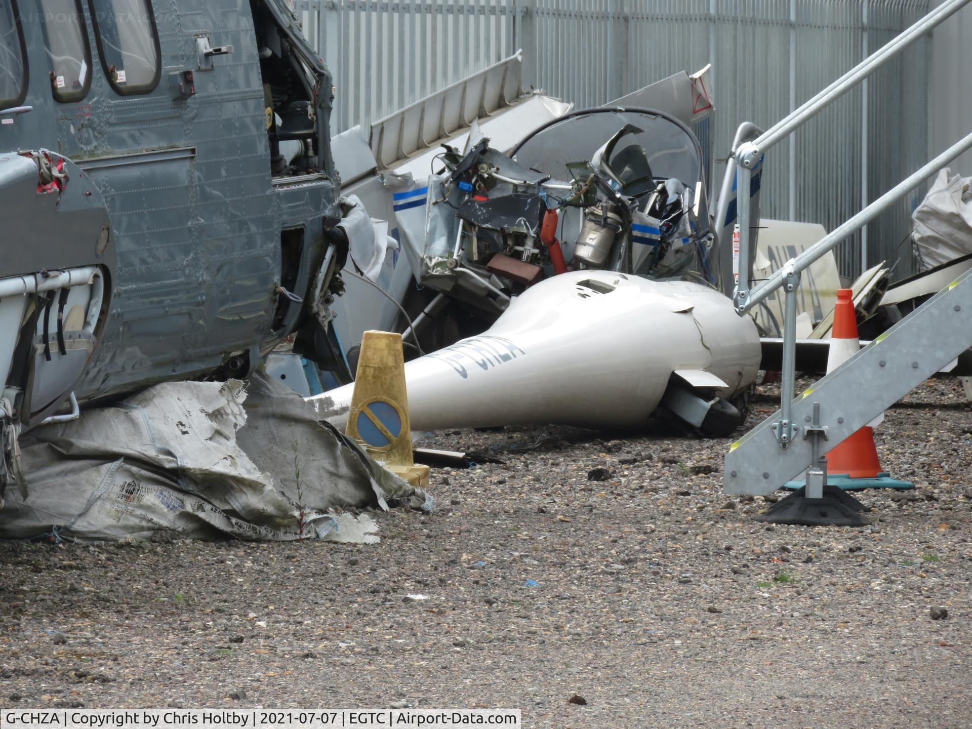 G-CHZA, 1987 Schempp-Hirth Nimbus-3/24.5 C/N 94, What remains of the glider at a scrapyard at Cranfield Airport