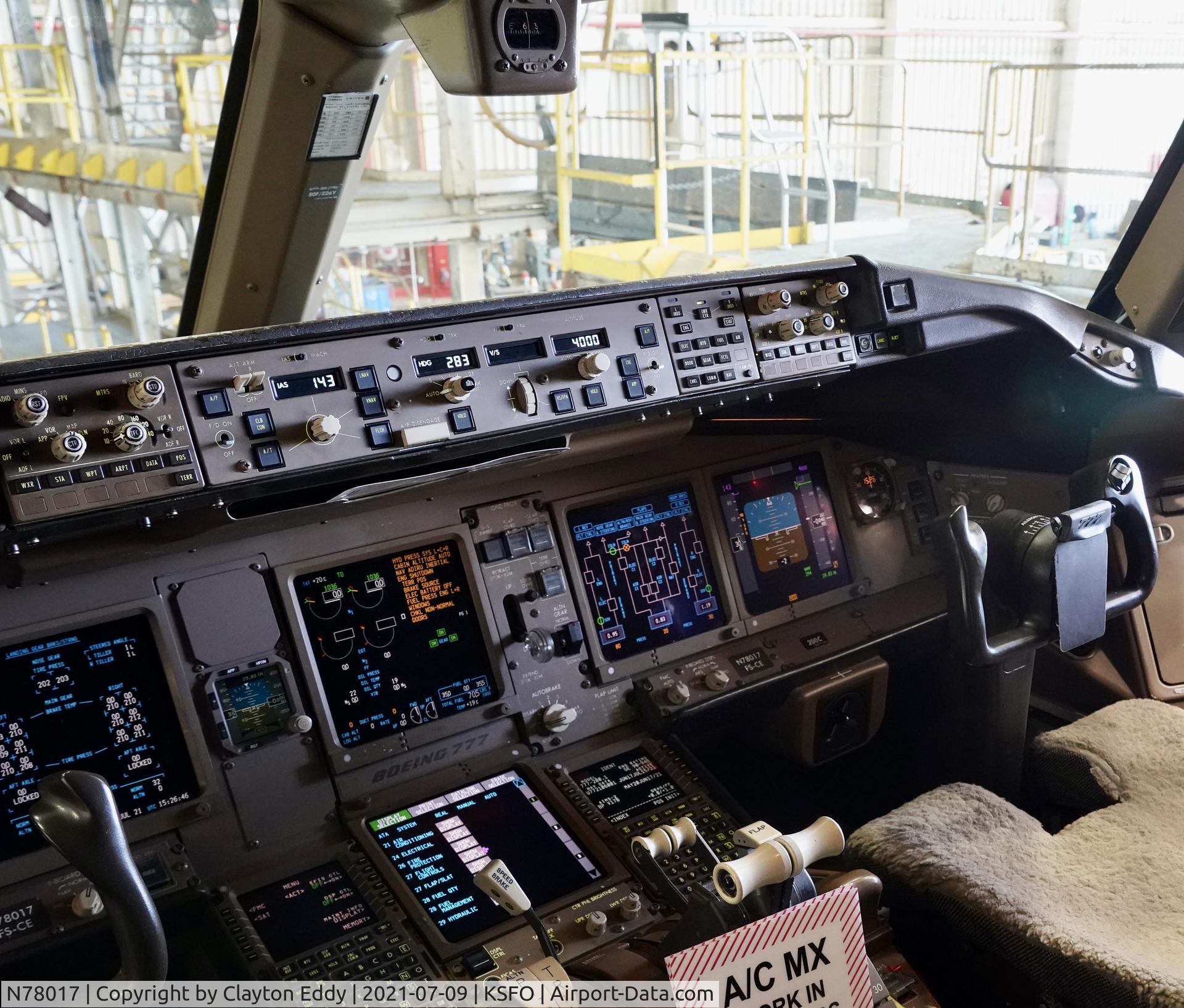 N78017, 2002 Boeing 777-224 (ER) C/N 31679, Flightdeck SFO 2021.