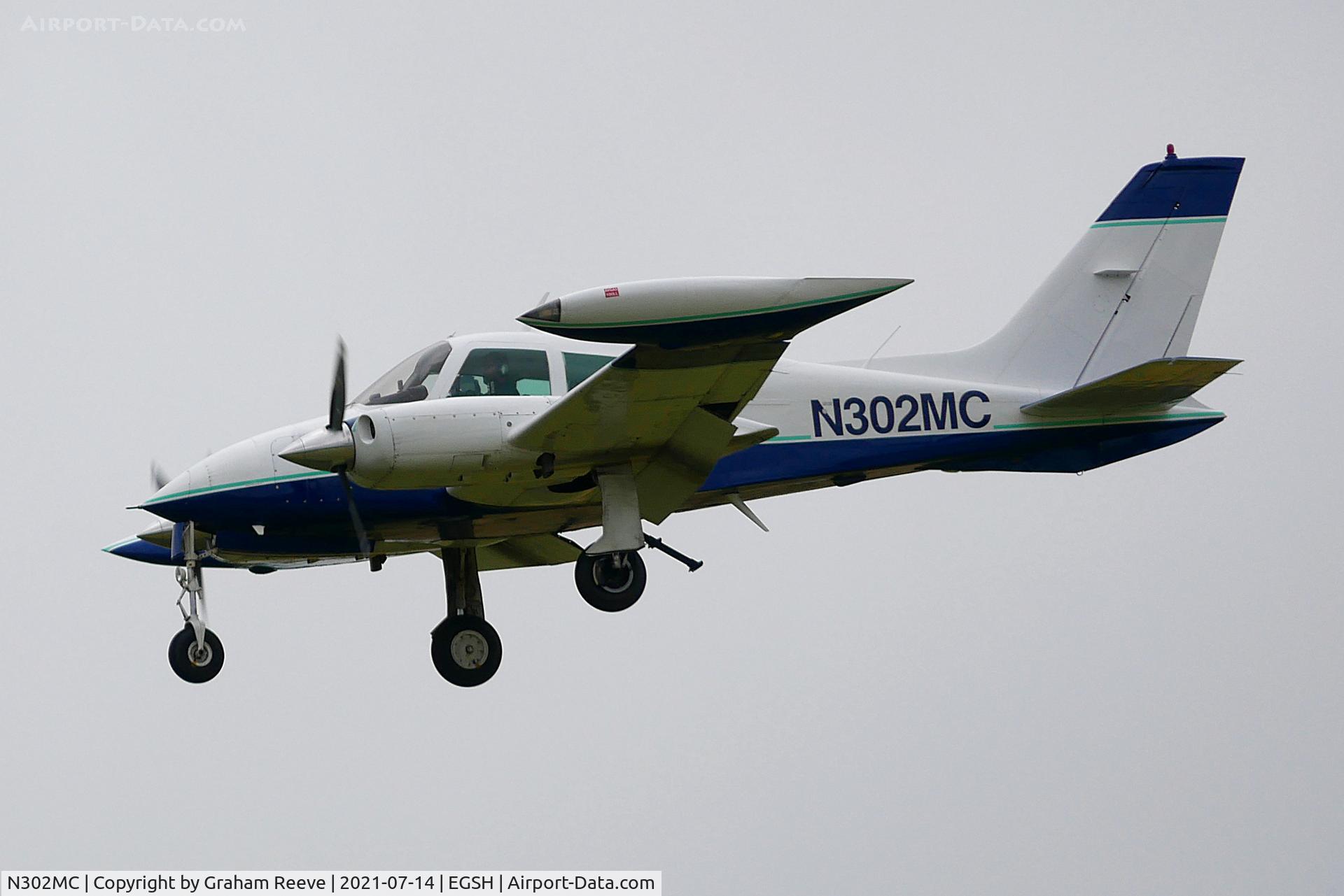 N302MC, 1973 Cessna T310Q C/N 310Q0909, Landing at Norwich.