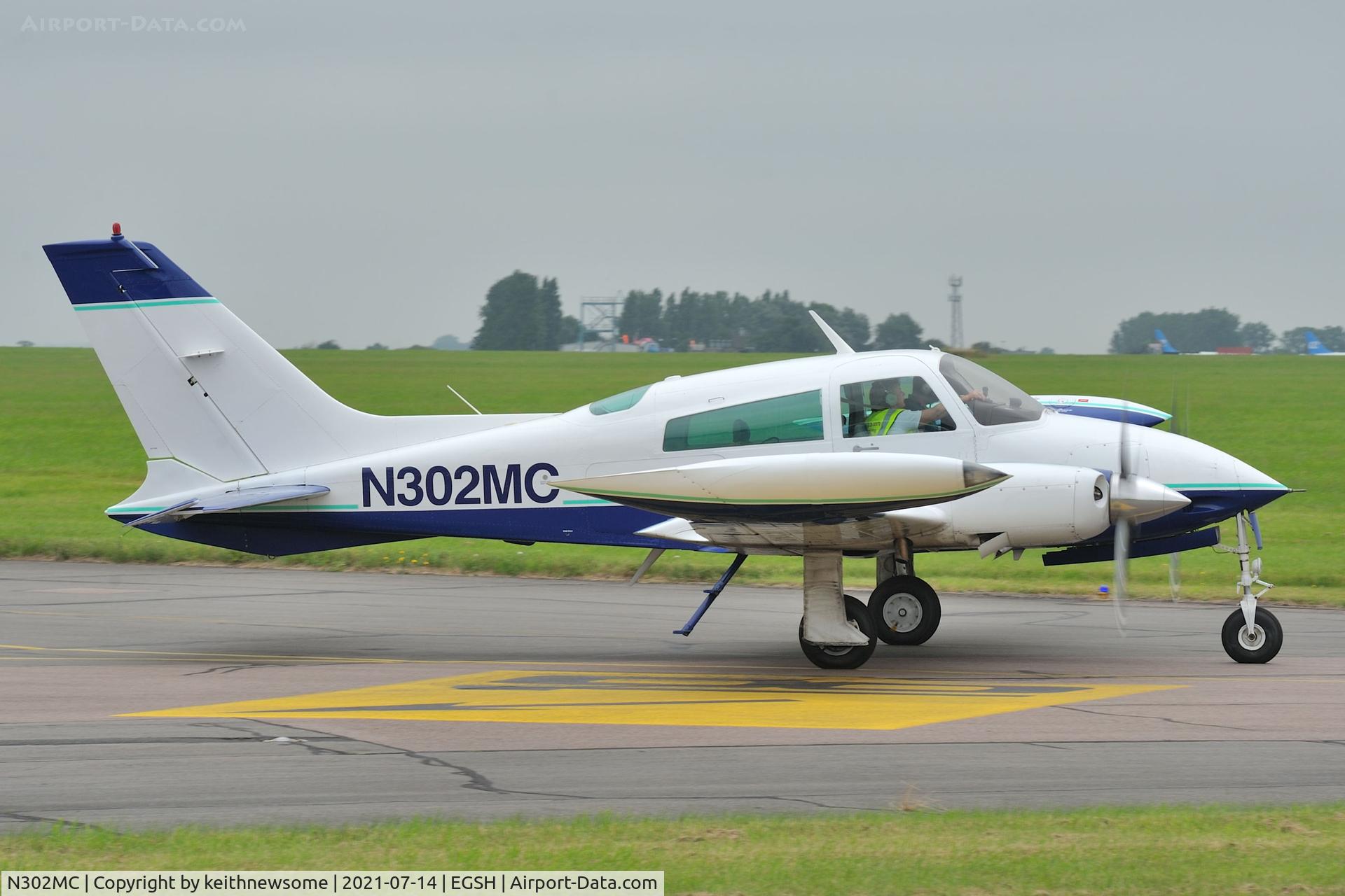 N302MC, 1973 Cessna T310Q C/N 310Q0909, Leaving Norwich for Southend.