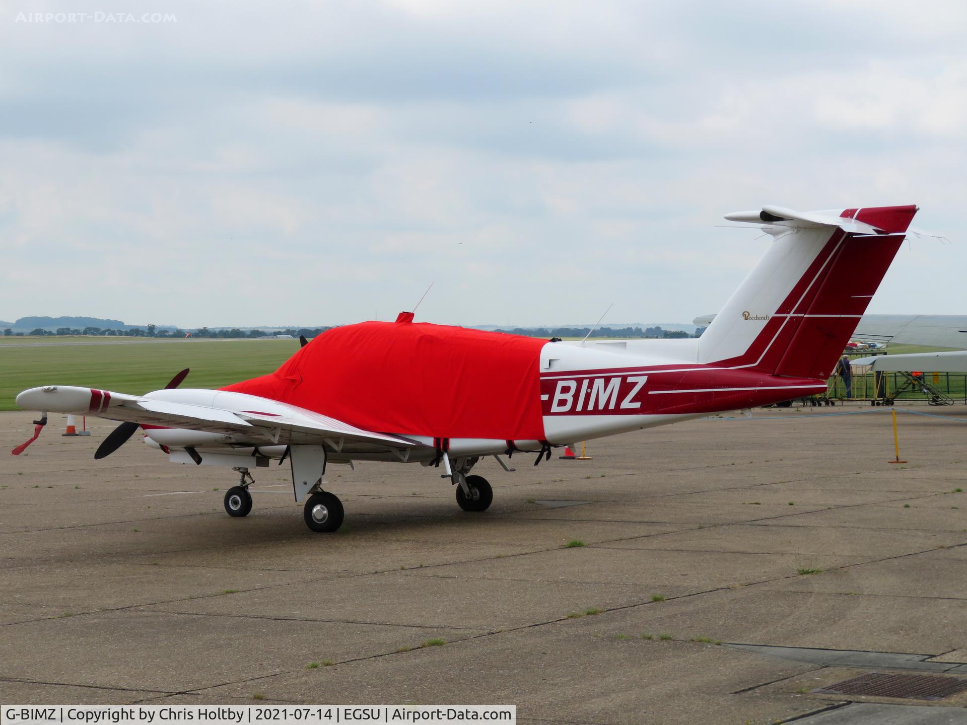G-BIMZ, 1979 Beech 76 Duchess C/N ME-169, Parked and covered at Duxford