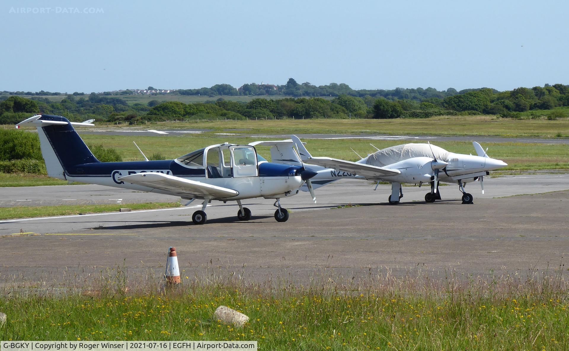 G-BGKY, 1978 Piper PA-38-112 Tomahawk Tomahawk C/N 38-78A0737, Resident Tomahawk and visiting DA-42 Twin Star N228US.