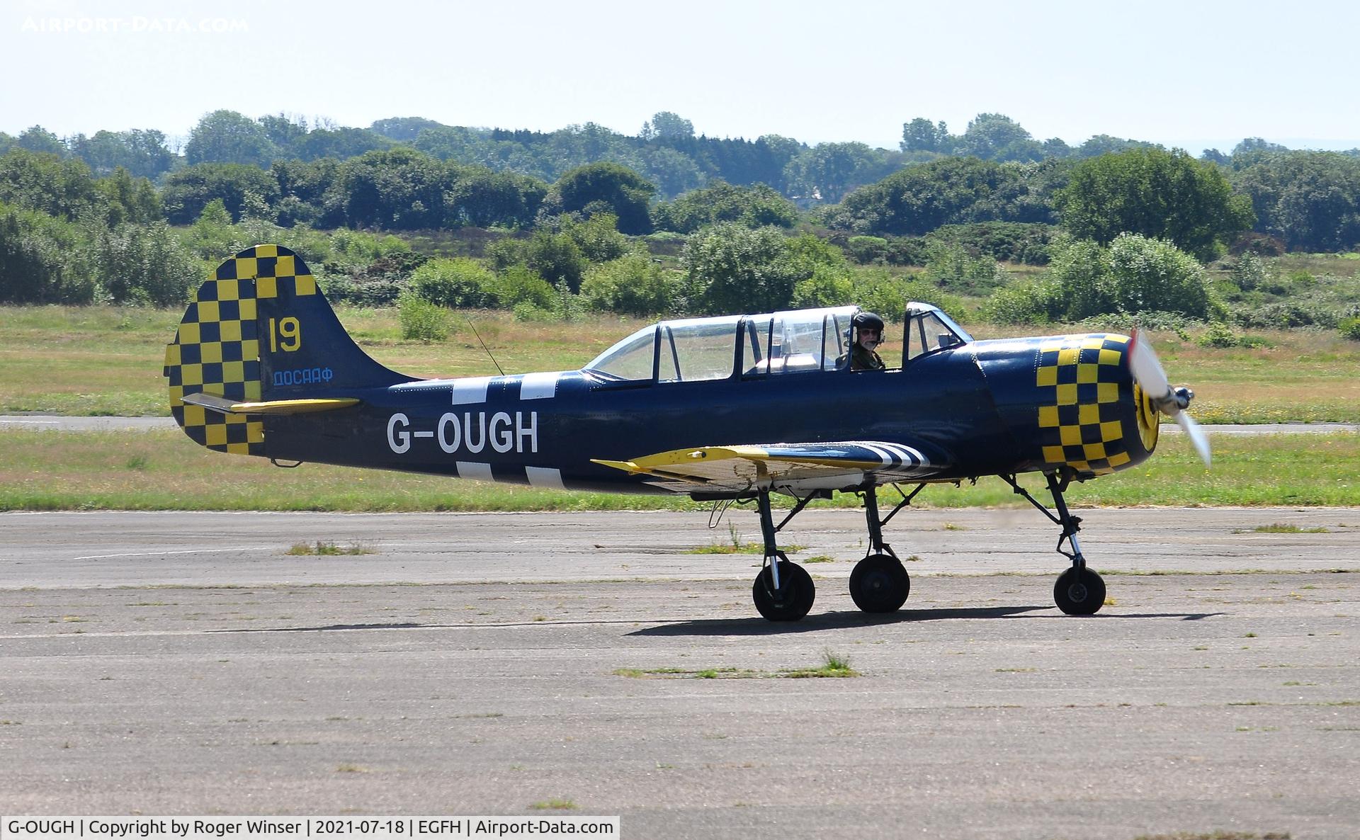 G-OUGH, 1987 Bacau Yak-52 C/N 877404, Resident Yak-52. DOSAAF/Yellow 19.