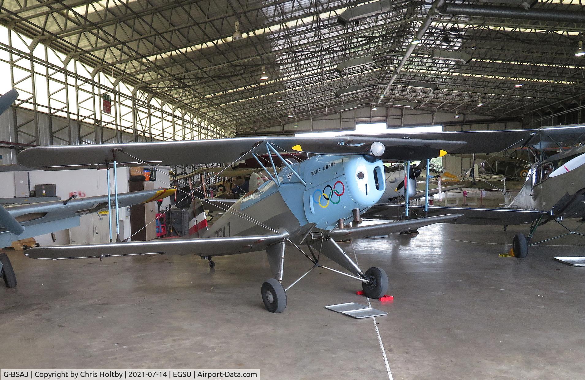 G-BSAJ, 1954 CASA 1-131E Jungmann C/N 2209, In the flying aircraft hangar at Duxford