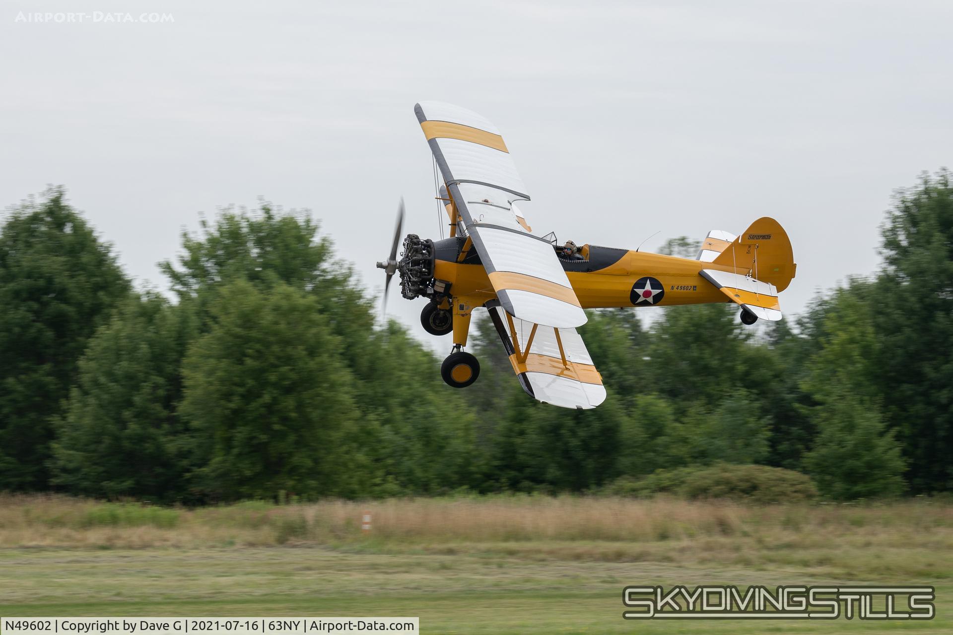 N49602, 1942 Boeing A75N1(PT17) C/N 75-2966, Low pass over Shear Airport, NY.