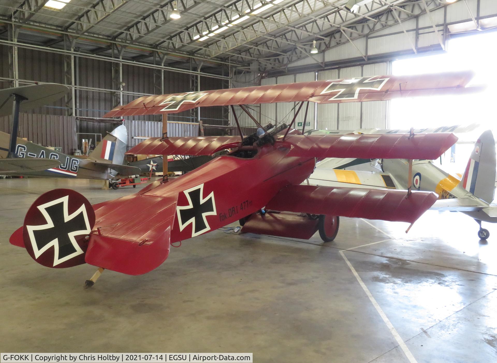 G-FOKK, 2006 Fokker Dr.1 Triplane Replica C/N PFA 238-14253, 2006 built Fokker Triplane in the flying aircraft hangar at Duxford