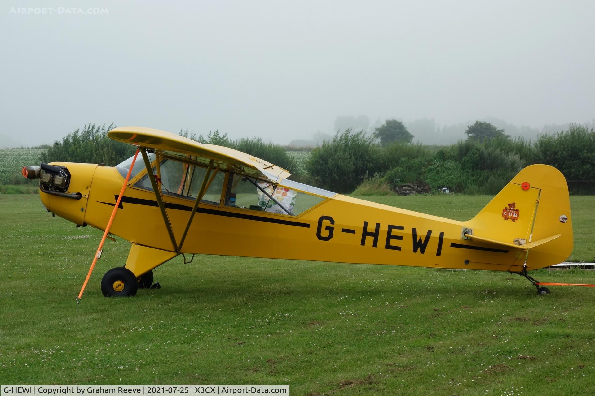 G-HEWI, 1944 Piper L-4J Grasshopper (J3C-65D) C/N 12566, Parked at Northrepps.