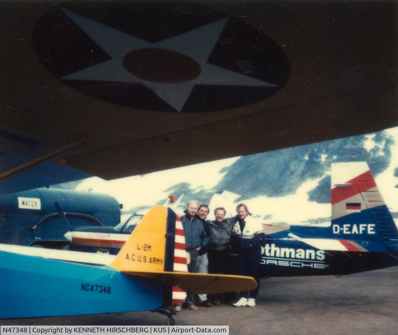 N47348, 1943 Taylorcraft DCO-65 C/N 5798, N47348 WITH PORSHE-MOONEY AT KULUSUK, GREENLAND