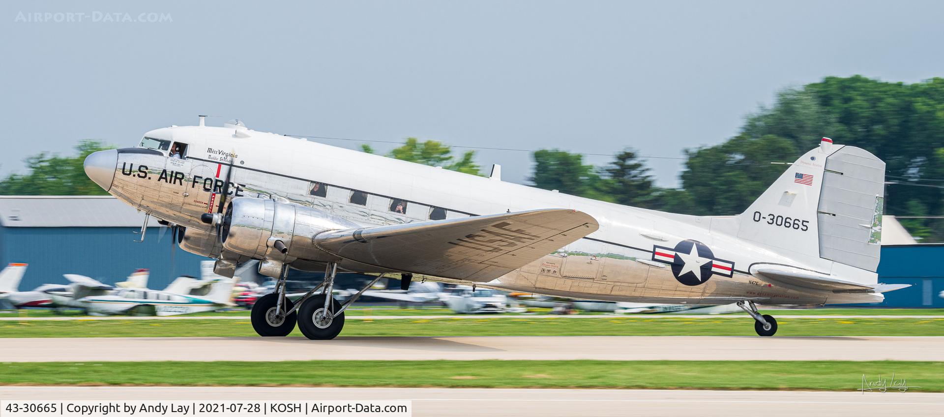 43-30665, 1943 Douglas DC-3C (C-47A-60-DL) C/N 13816, C-47 with aluminum finish and US markings on takeoff roll during EAA AirVenture in Oshkosh, WI.
