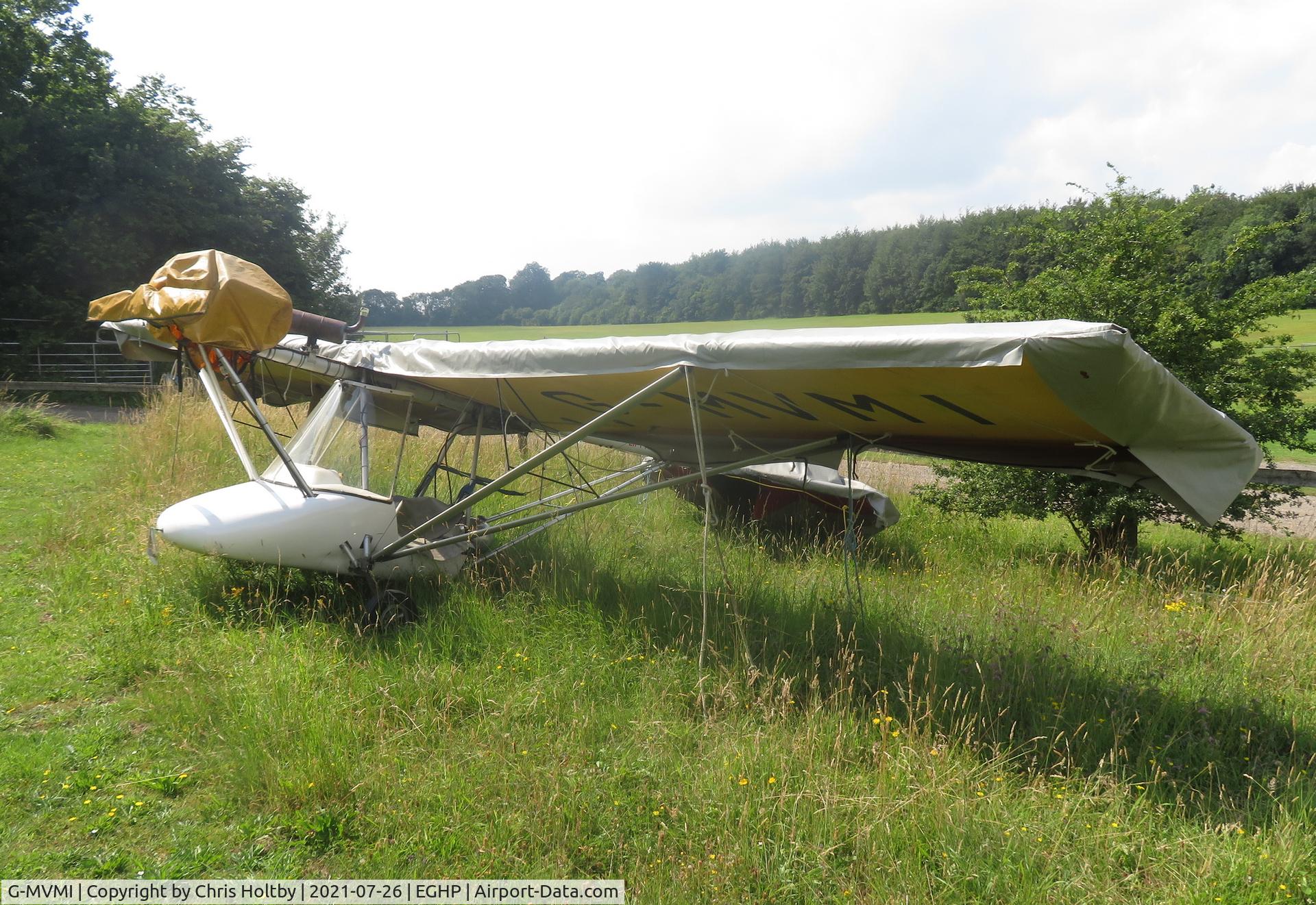 G-MVMI, 1988 Thruster TST MK1 C/N 8128-TST-114, Parked and covered at Popham Airfield, Hants