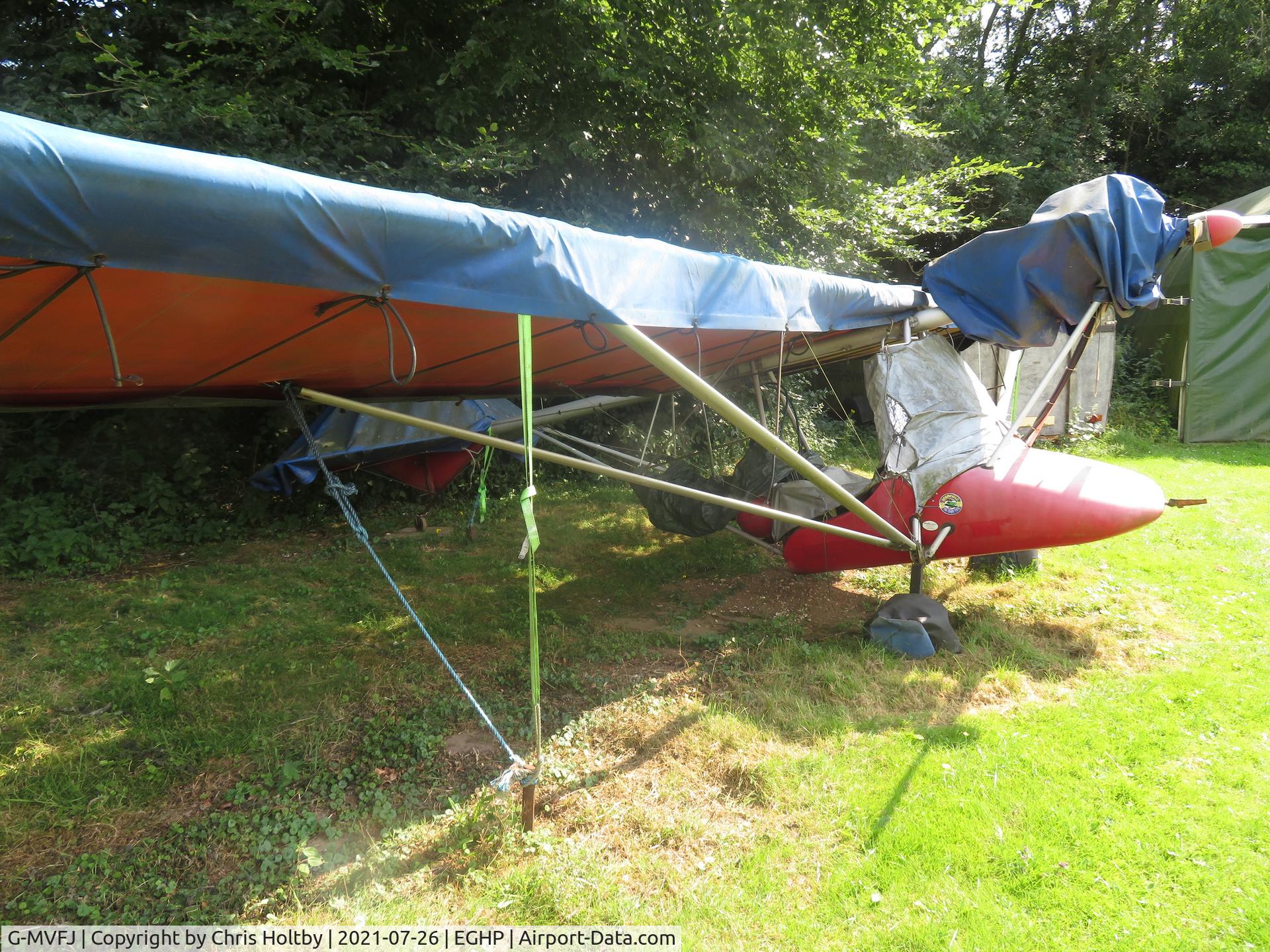 G-MVFJ, 1988 Thruster TST MK1 C/N 8088-TST-092, Parked and covered at Popham