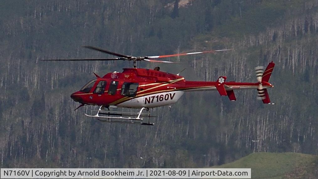 N7160V, 1996 Bell 407 C/N 53013, Very attractive heli captured before a summertime landing near the Steamboat Springs Ski Area.