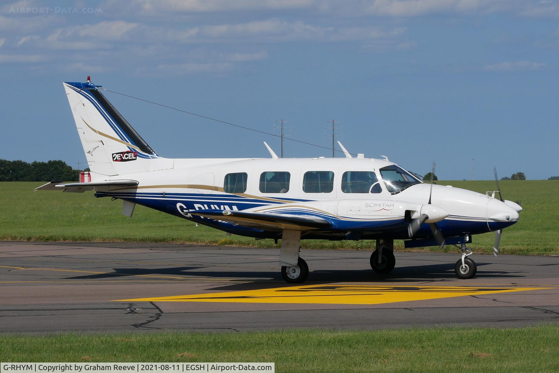 G-RHYM, 1972 Piper PA-31-310 Navajo C/N 31-815, Departing from Norwich.