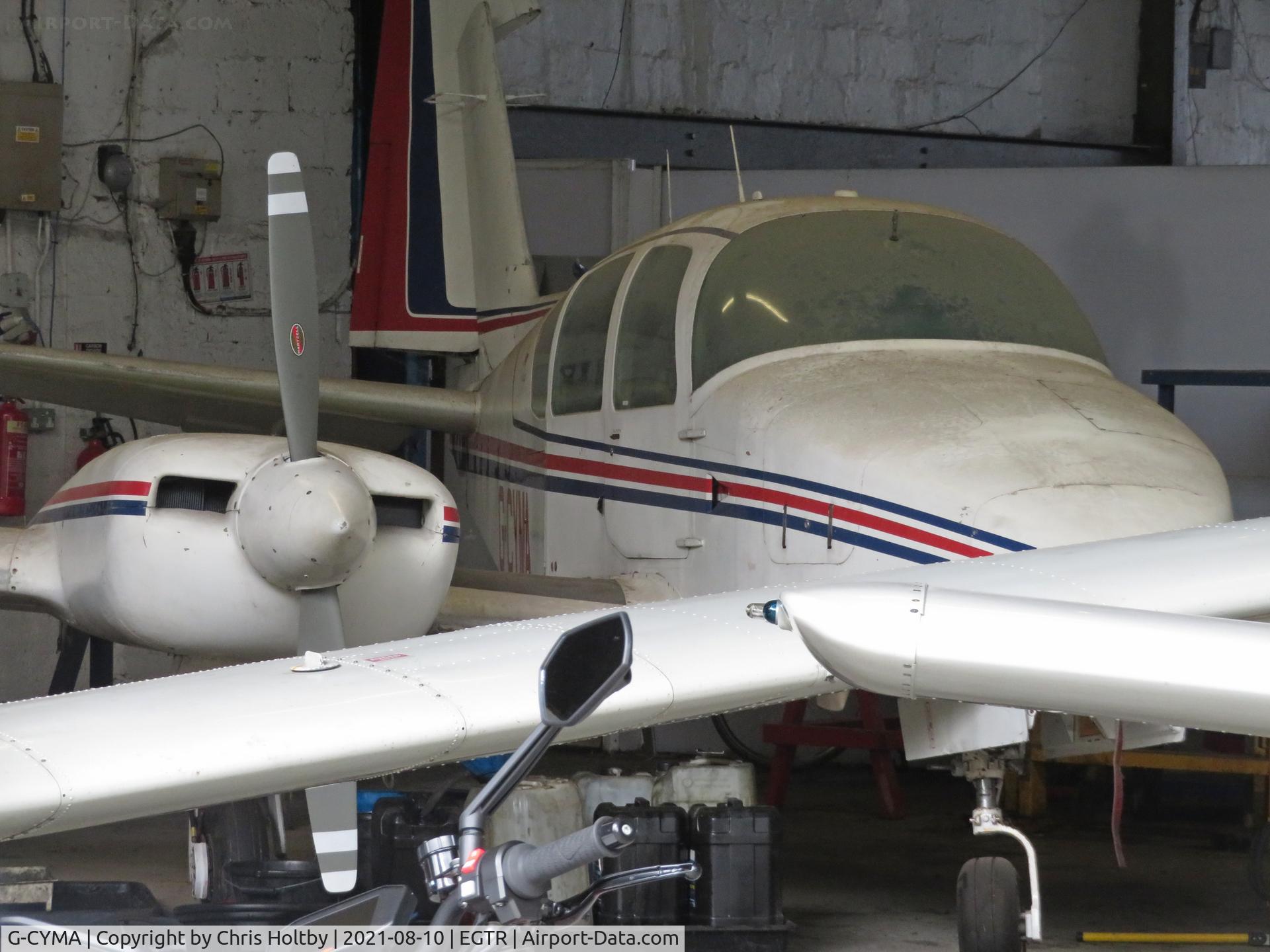 G-CYMA, 1979 Gulfstream American GA-7 Cougar C/N GA7-0083, In the maintenance hangar at Elstree and in need of some TLC