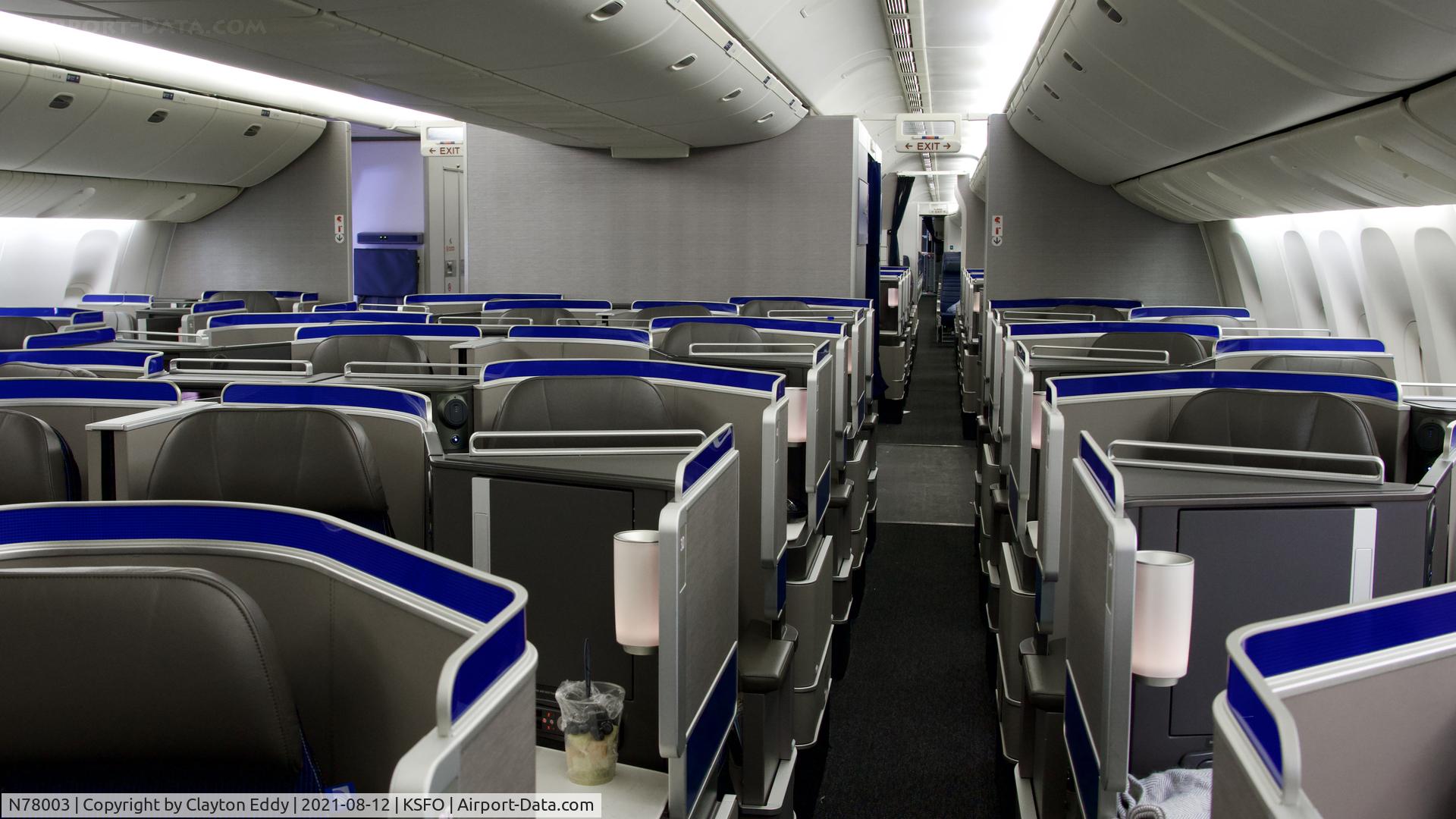 N78003, 1998 Boeing 777-224 C/N 27579, Lay flat seats. SFO. 2021.