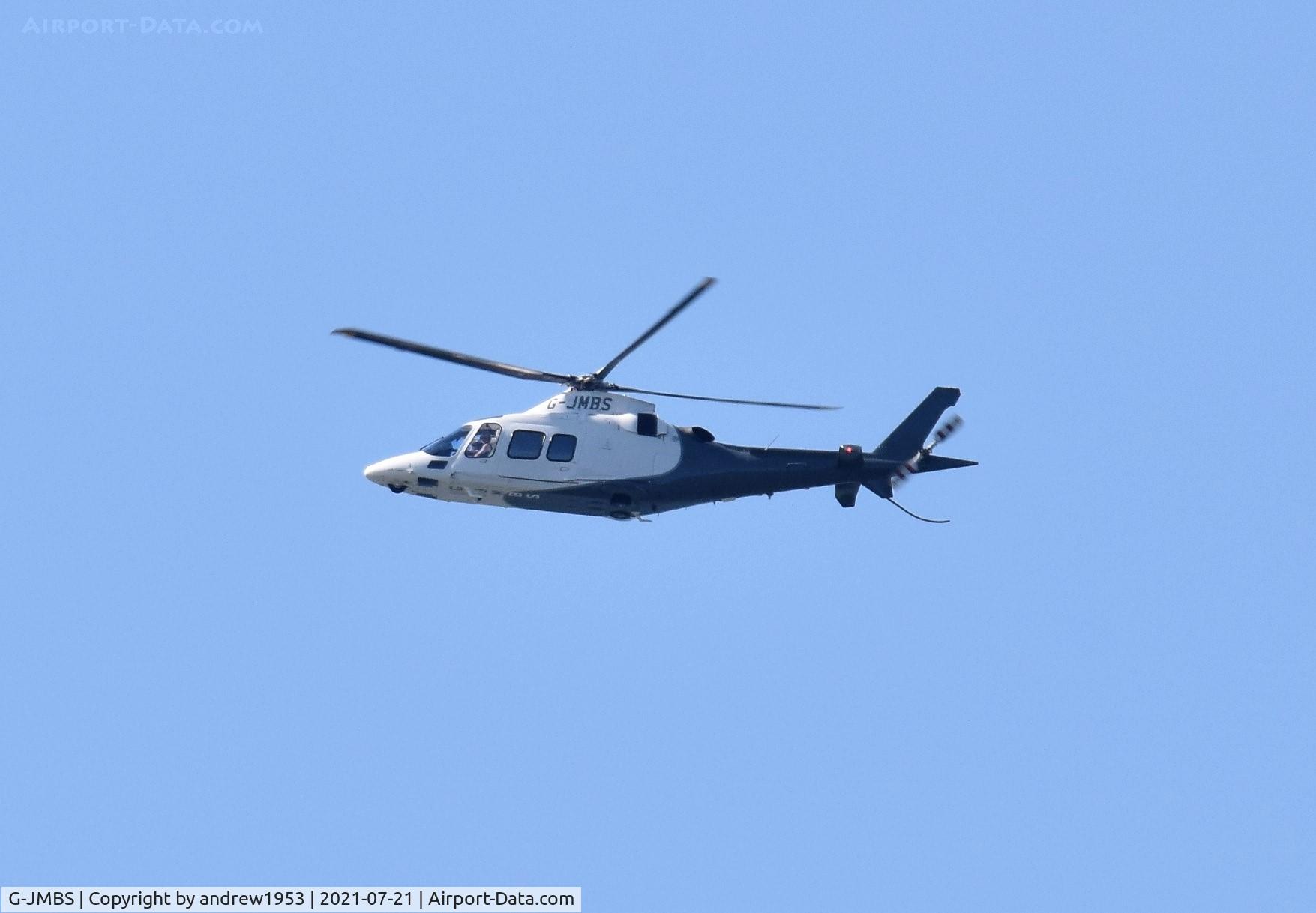 G-JMBS, 2009 Agusta A-109S Grand C/N 22148, G-JMBS over the Bristol Channel.