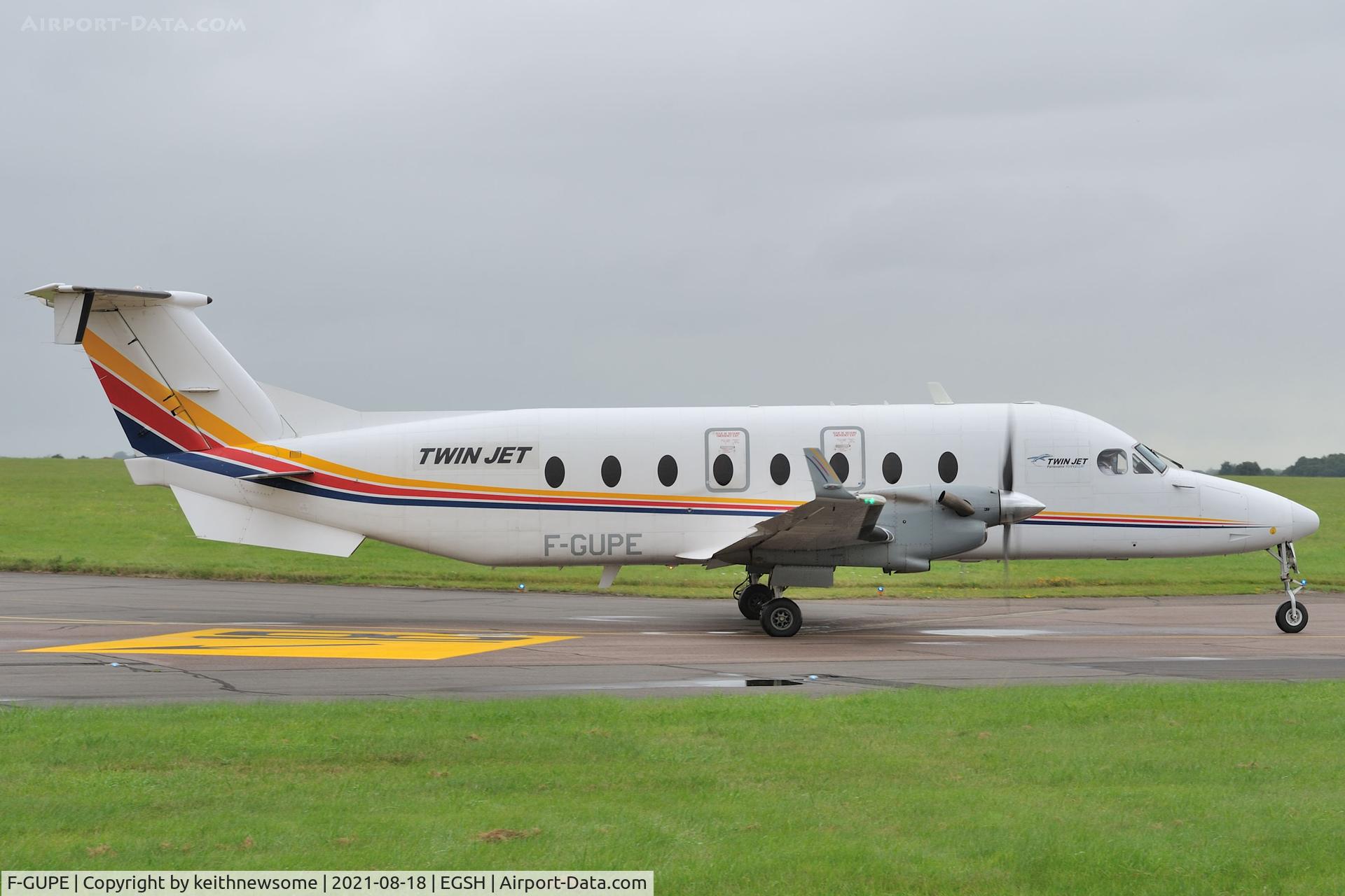 F-GUPE, 1996 Beech 1900D C/N UE-248, Leaving Norwich for Esbjerg.