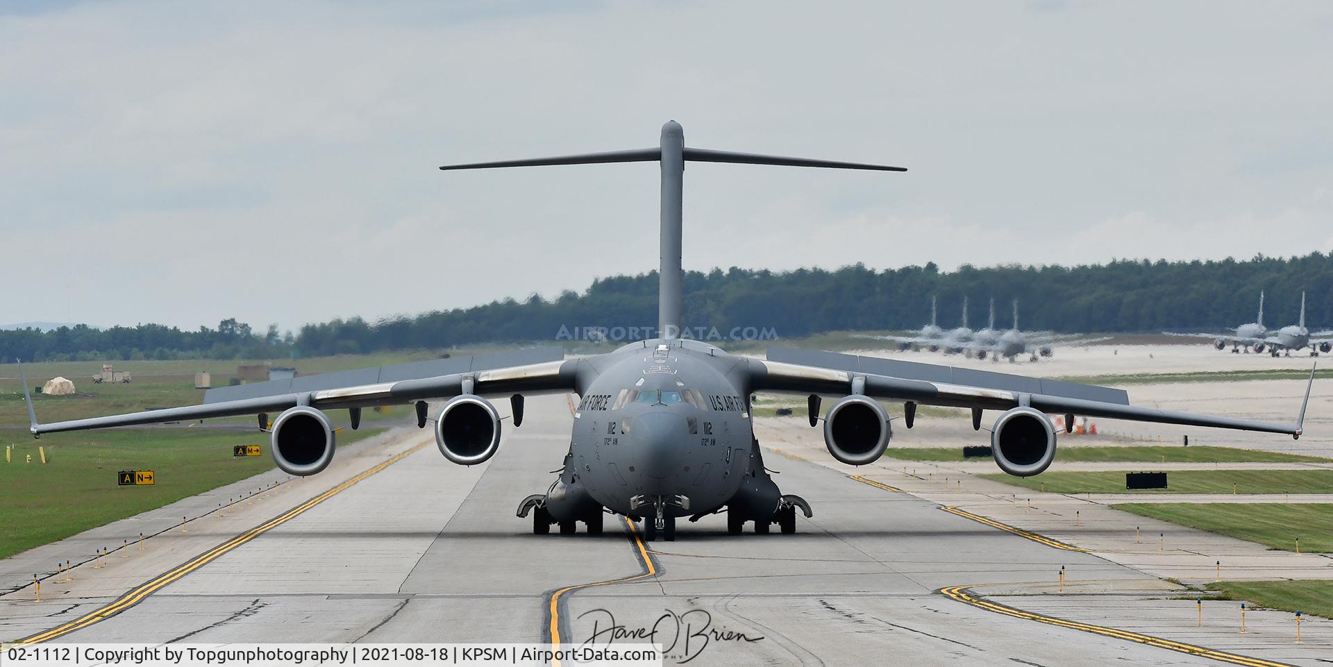 02-1112, 2002 Boeing C-17A Globemaster III C/N P-112, REACH911 in for a gas & go and taxing to the active to depart.