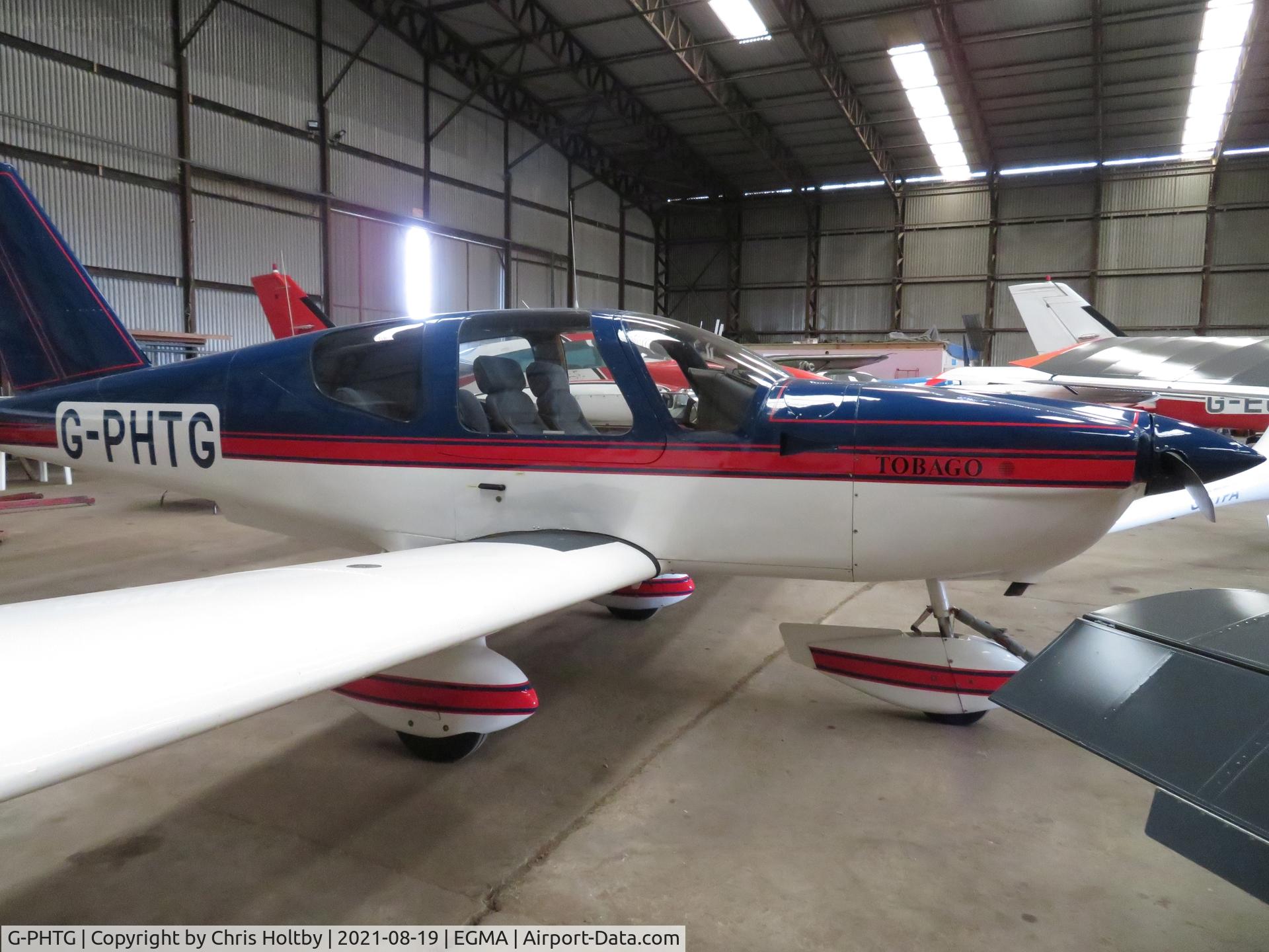 G-PHTG, 1990 Socata TB-10 Tobago C/N 1008, In the hangar at Fowlmere Airfield, Cambs.