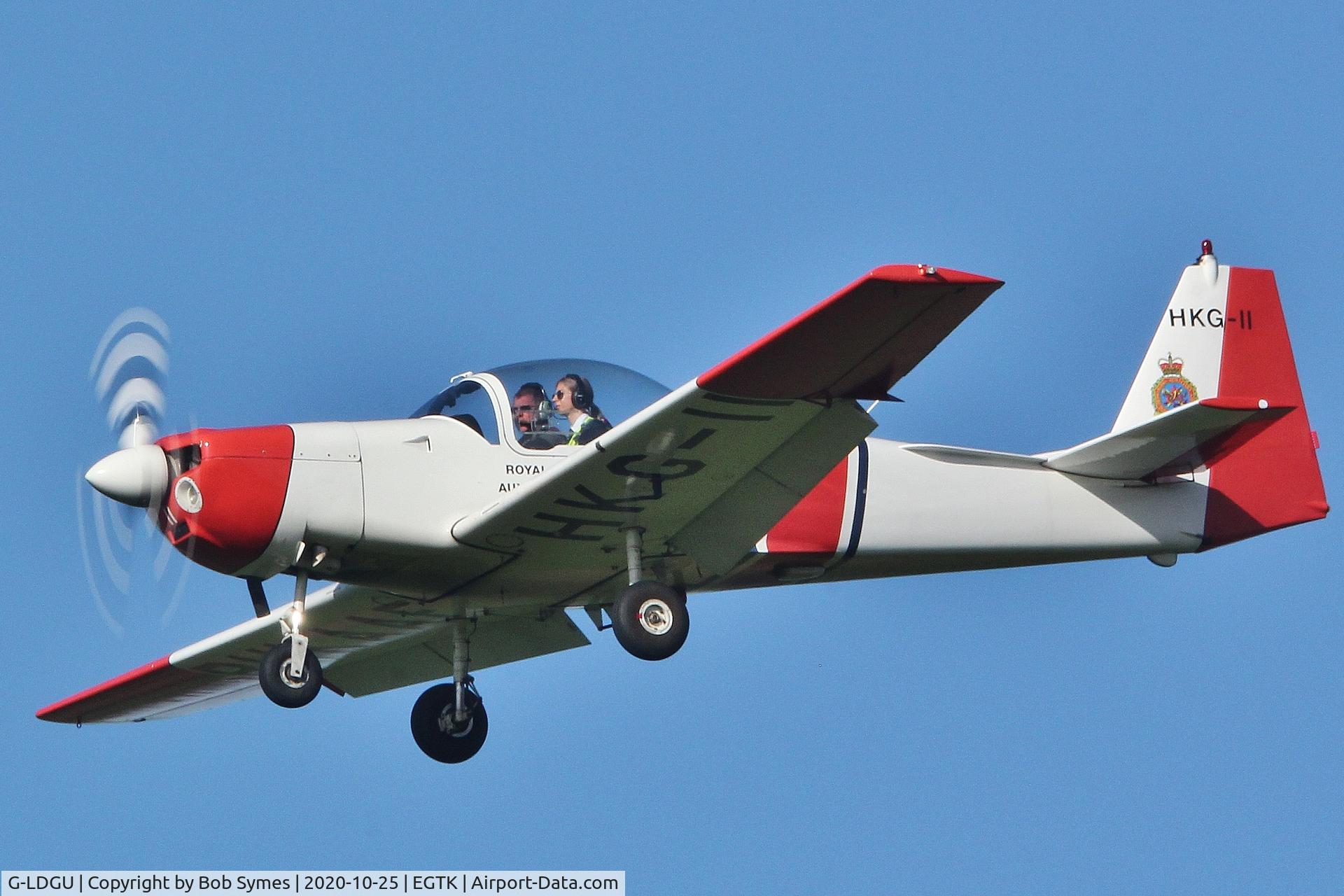 G-LDGU, 1987 Slingsby T-67M-200 Firefly C/N 2042, Seen landing at London Oxford , home base . Willremain in Hong Kong c/s