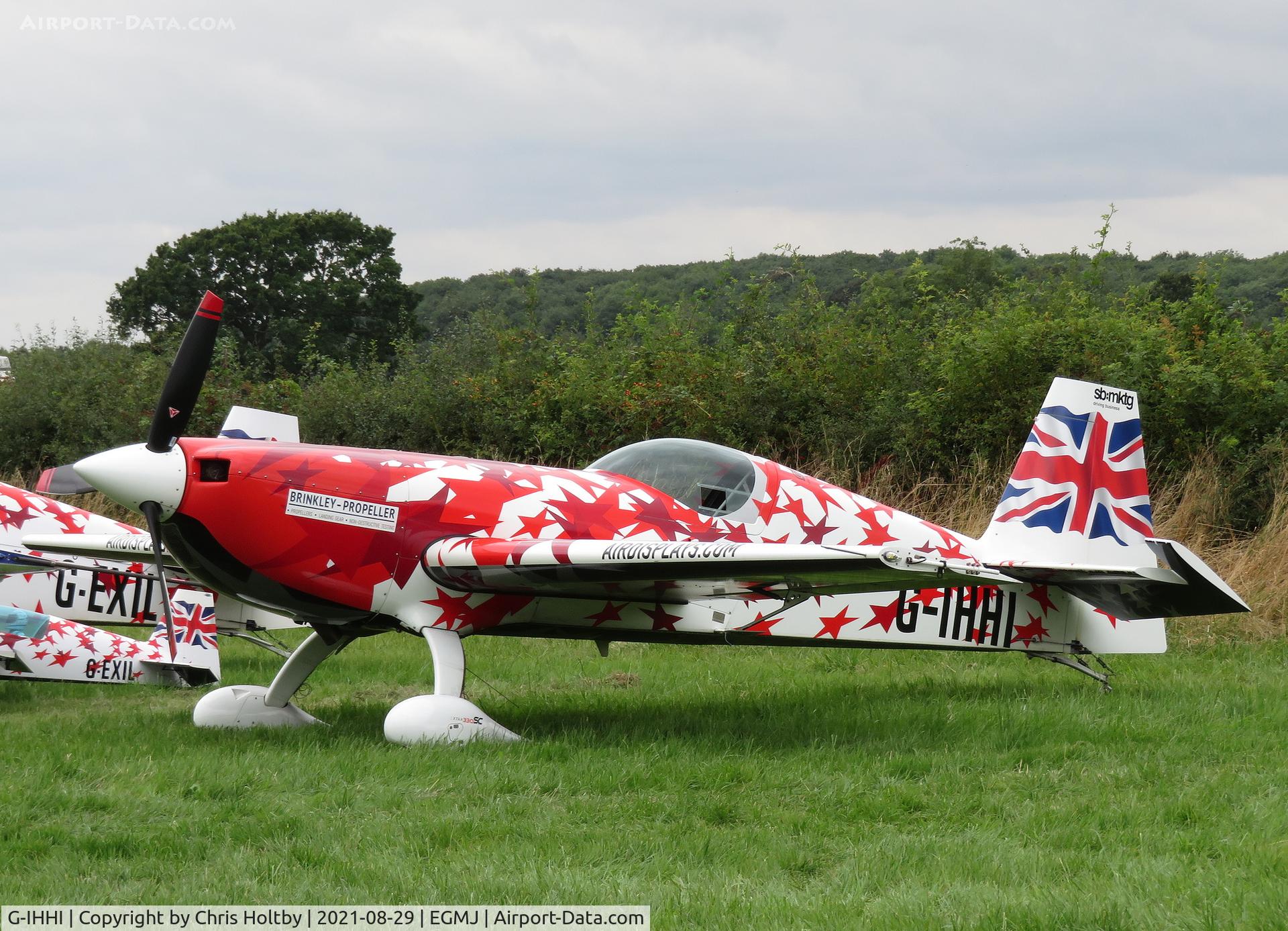 G-IHHI, 2016 Extra EA-300SC C/N SC060, Lined up with its Global Stars team mates before its display at Little Gransden Airshow 2021 Cambs.
