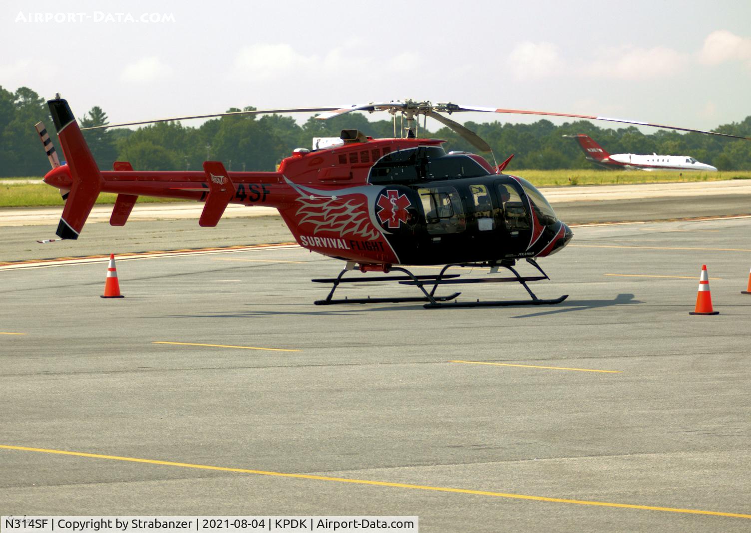 N314SF, Bell 407 C/N 53552, On the ramp at KPDK after a flight from Gadsden, AL, in the wee hours of the morning
