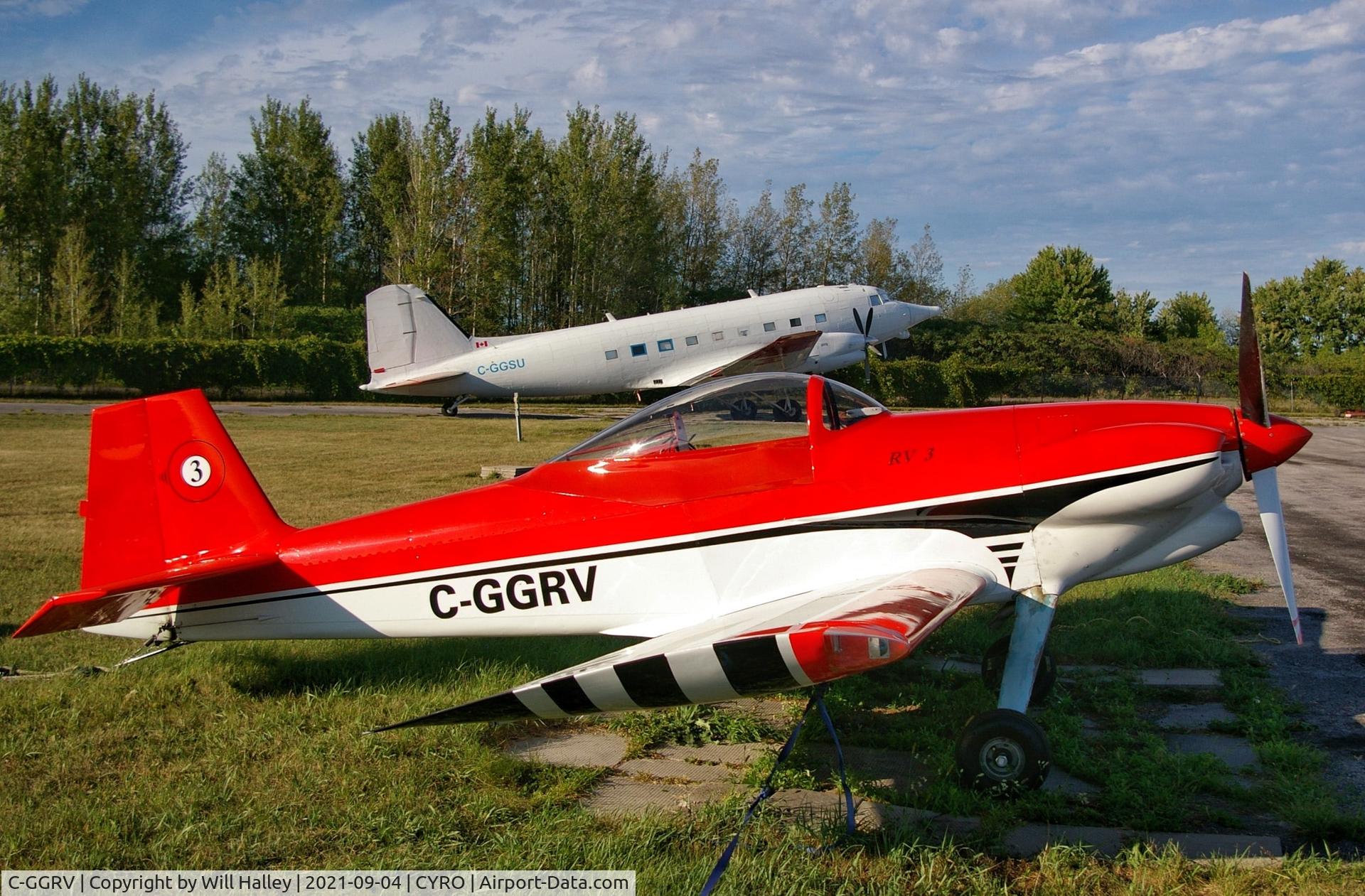 C-GGRV, 1983 Vans RV-3 C/N MB 1, RV-3 with a DC-3 in the background