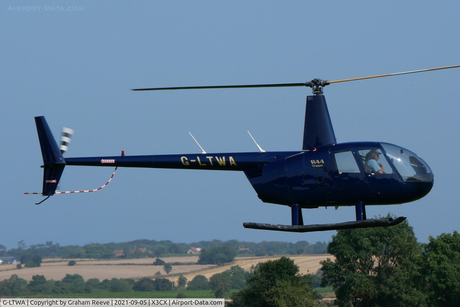 G-LTWA, 2000 Robinson R44 Clipper C/N 0816, Landing at Northrepps.