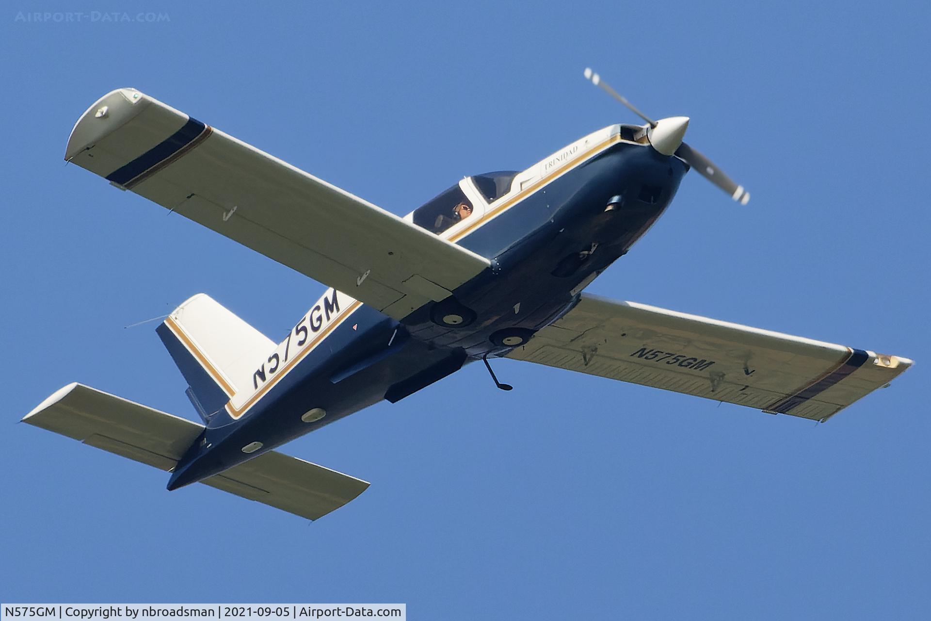 N575GM, 1998 Socata TB-20 Trinidad C/N 1872, Seen flying low over North Norfolk