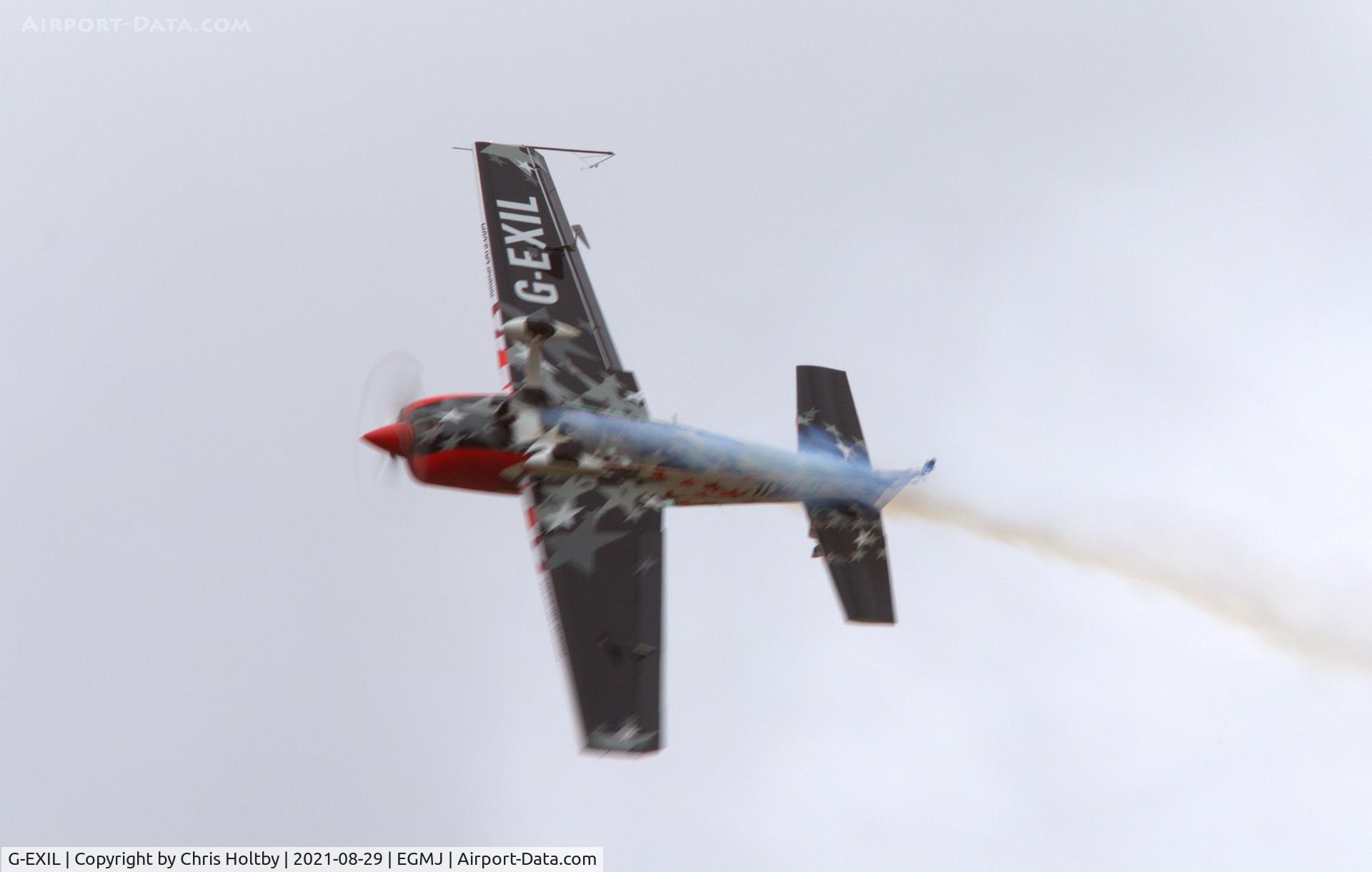 G-EXIL, 2010 Extra EA-300S C/N 1036, Extra in its Global Stars livery performing at Little Gransden Airshow 2021