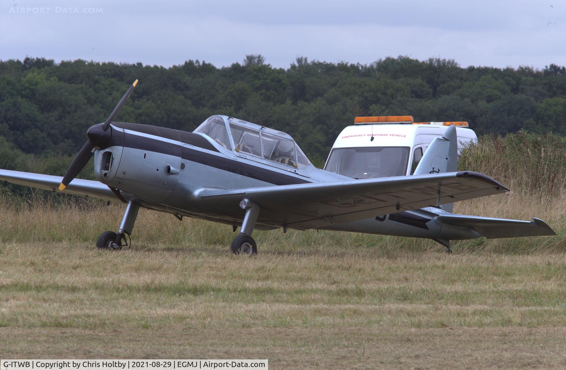 G-ITWB, 1958 OGMA DHC-1 Chipmunk T.20 C/N OGMA-48, Parked in the aircraft park at Little Gransden Airshow 2021 visiting from Rougham