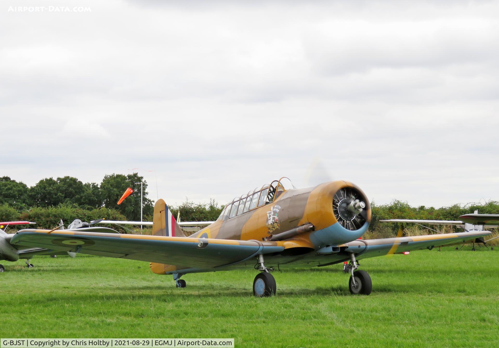 G-BJST, 1953 Canadian Car & Foundry T-6H Harvard Mk.4M C/N 14A-2429, Taxing for take -off at the Little Gransden Airshow 2021 and 'Wacky Wabbit' was about to give a thrilling solo display