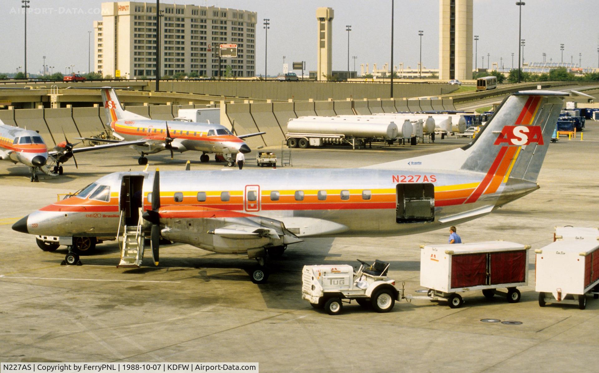 N227AS, 1986 Embraer EMB-120RT Brasilia C/N 120023, ASA EMB120 in the DL commuter corner of DFW
