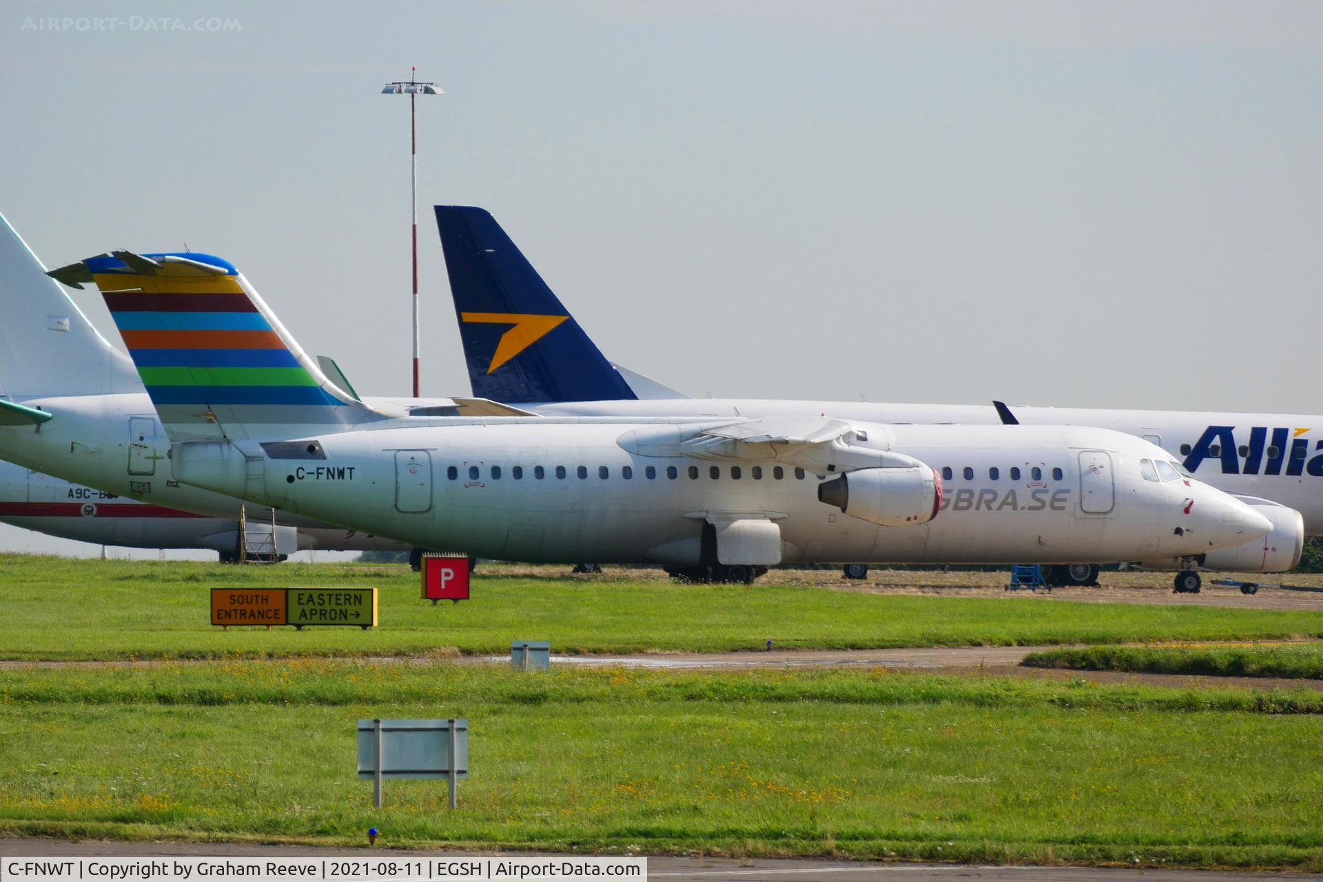 C-FNWT, British Aerospace Avro 146-RJ100 C/N E3250, Parked at Norwich.