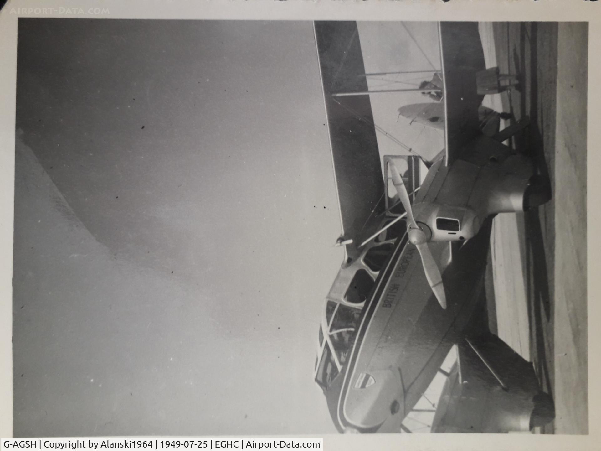 G-AGSH, 1945 De Havilland DH-89A Dominie/Dragon Rapide C/N 6884, My mother Mrs Edna Hopgood then aged 19 about to board G-AGSH operated by BEA in the late 1940s on the Land's End to Scilly Isles route.