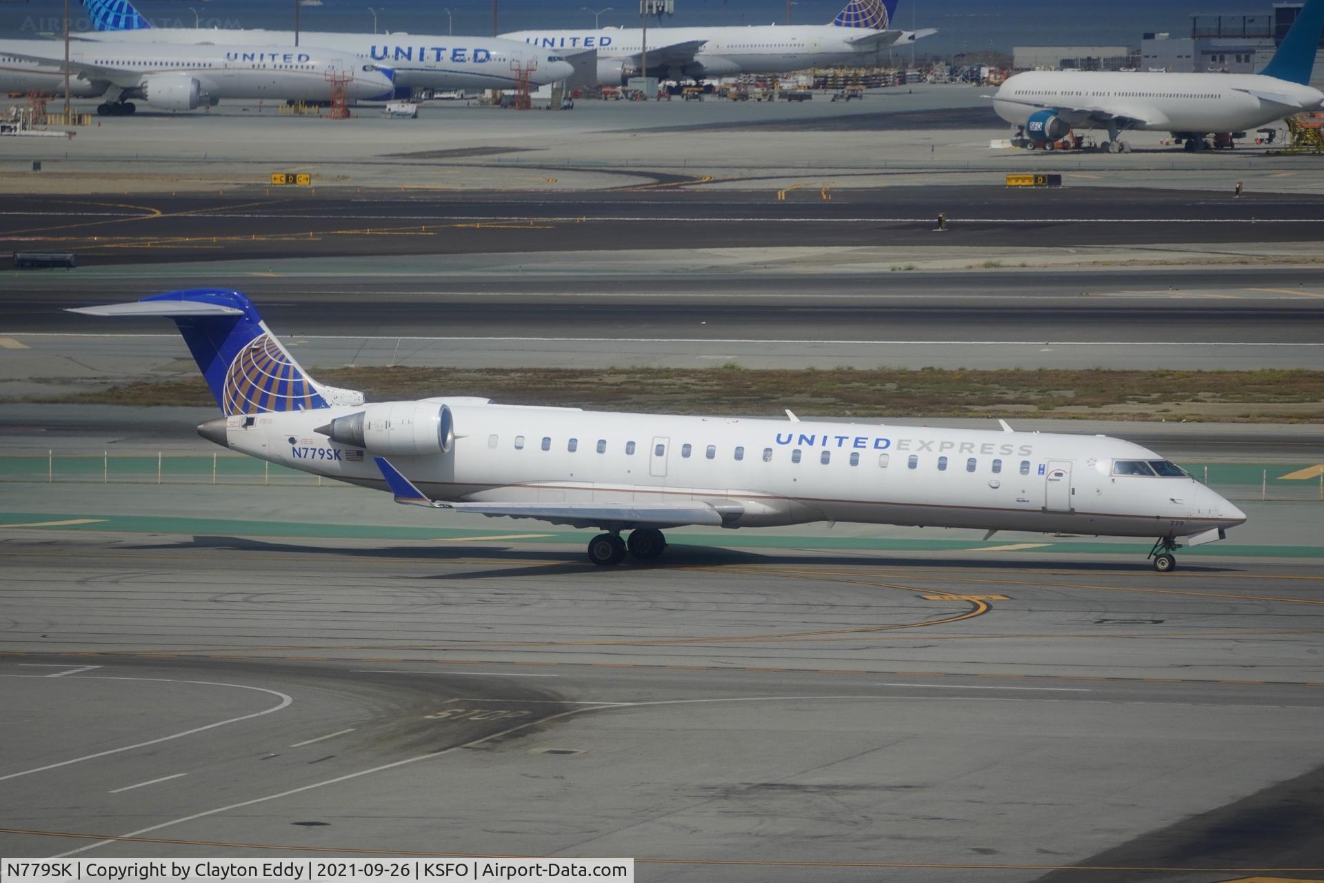 N779SK, 2009 Bombardier CRJ-702 (CL-600-2C10) Regional Jet C/N 10276, Sky Terrace SFO 2021.